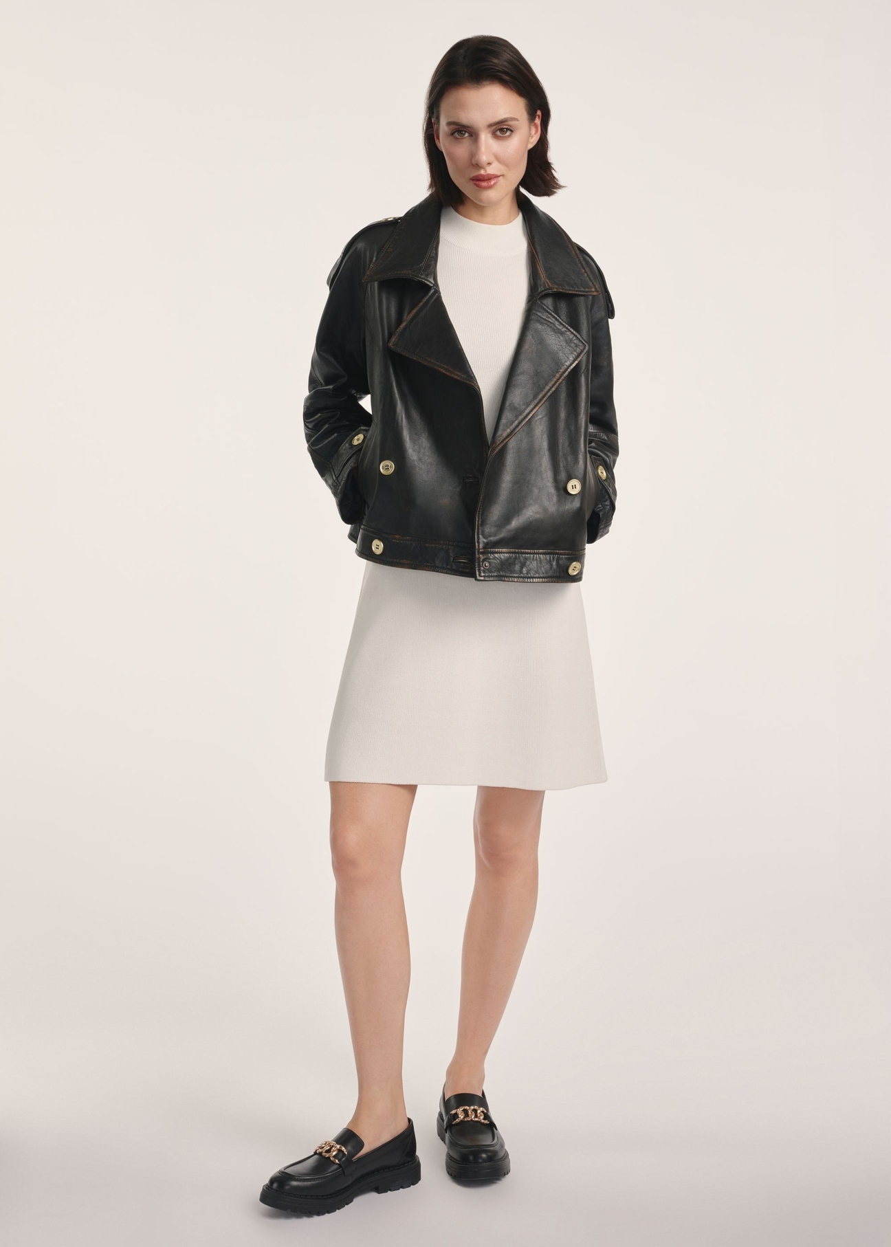 Brown oversize women's leather jacket KURDS-0553-2737(Z25), product visible from the front on the model, the entire silhouette is visible.