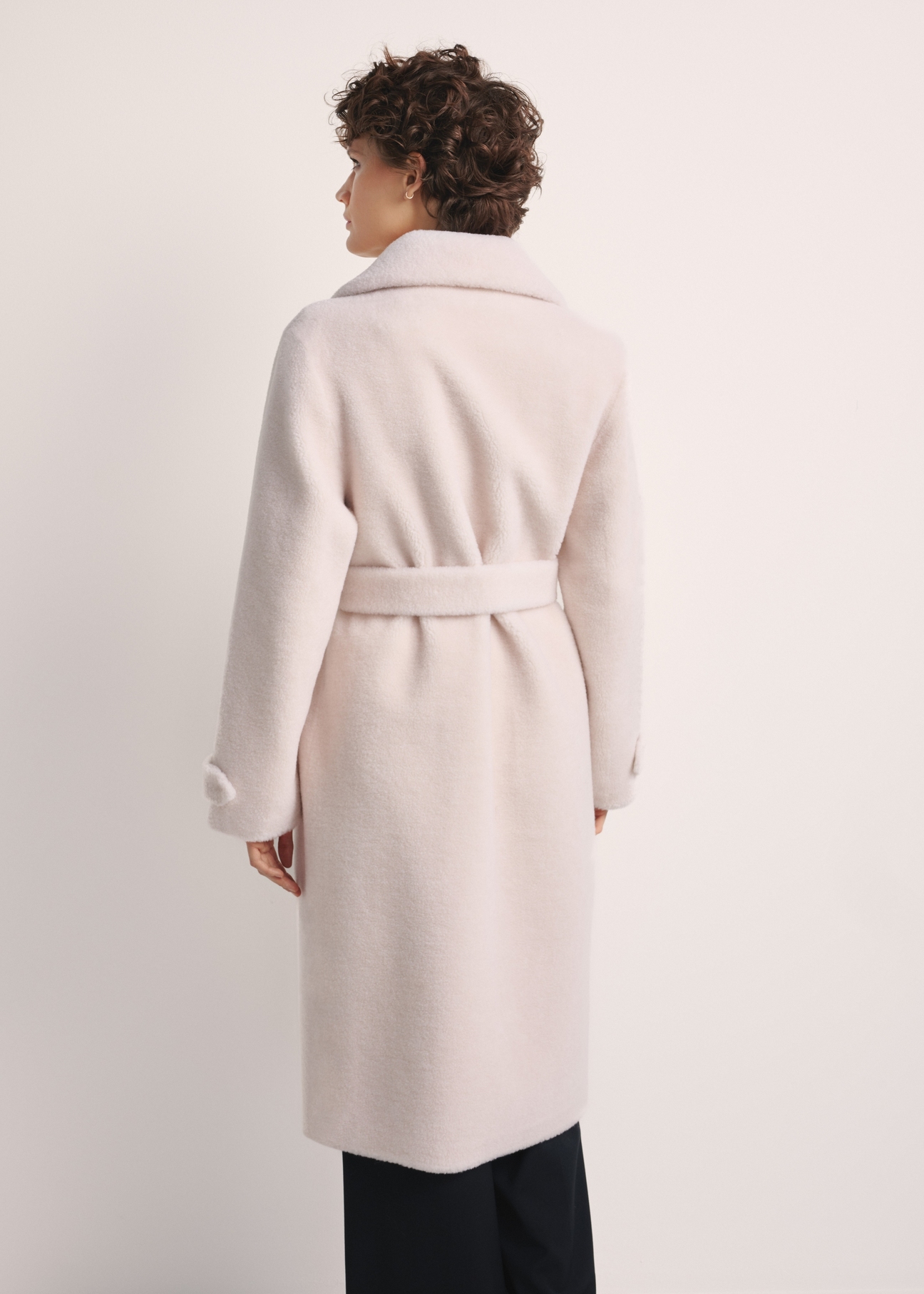 Long woolen fur coat in cream color FUTDW-0019A-12(Z25) - product view from the back on a white background. The whole silhouette is visible.