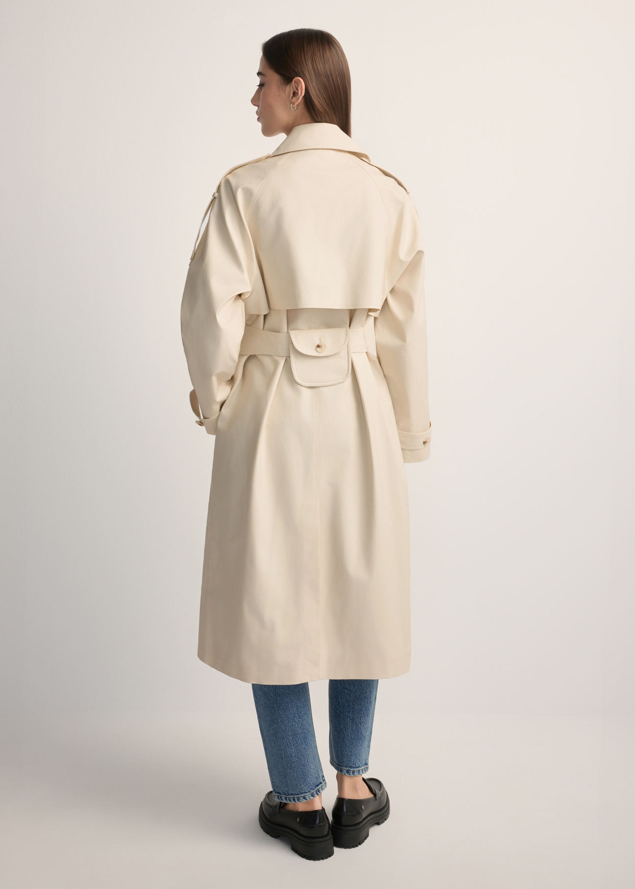 Long cream oversize women's coat KURDT-0659-0C(W26), back view of the product on the model. Full silhouette visible.