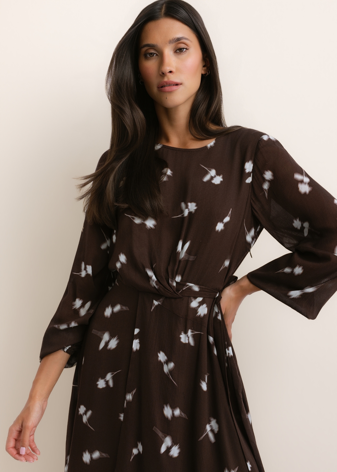 Brown floral midi dress SUKDT-0291-1P(Z26), front view of the product on the model. Half of the silhouette visible.
