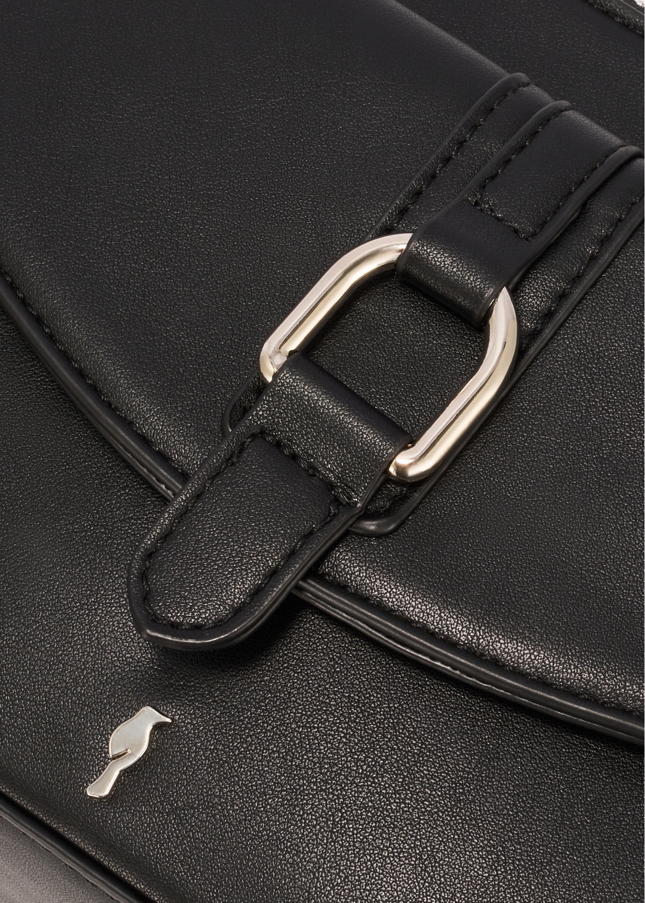 Black small women's handbag TOREC-1175-99(W26) - close-up of detail, on white background.