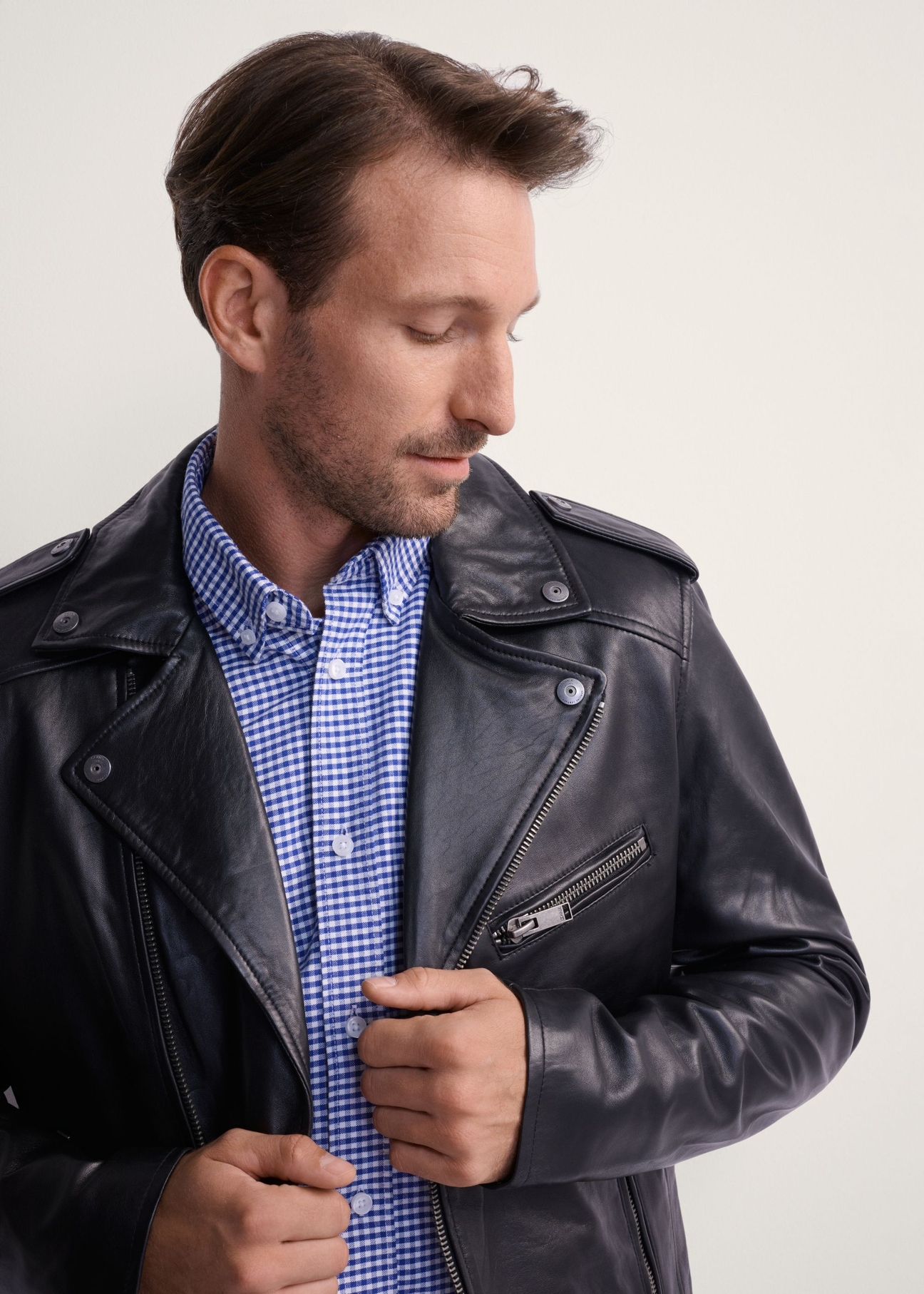 Men's genuine leather biker jacket KURMS-0292-99(KS), front view of the product on the model. Half of the silhouette visible.