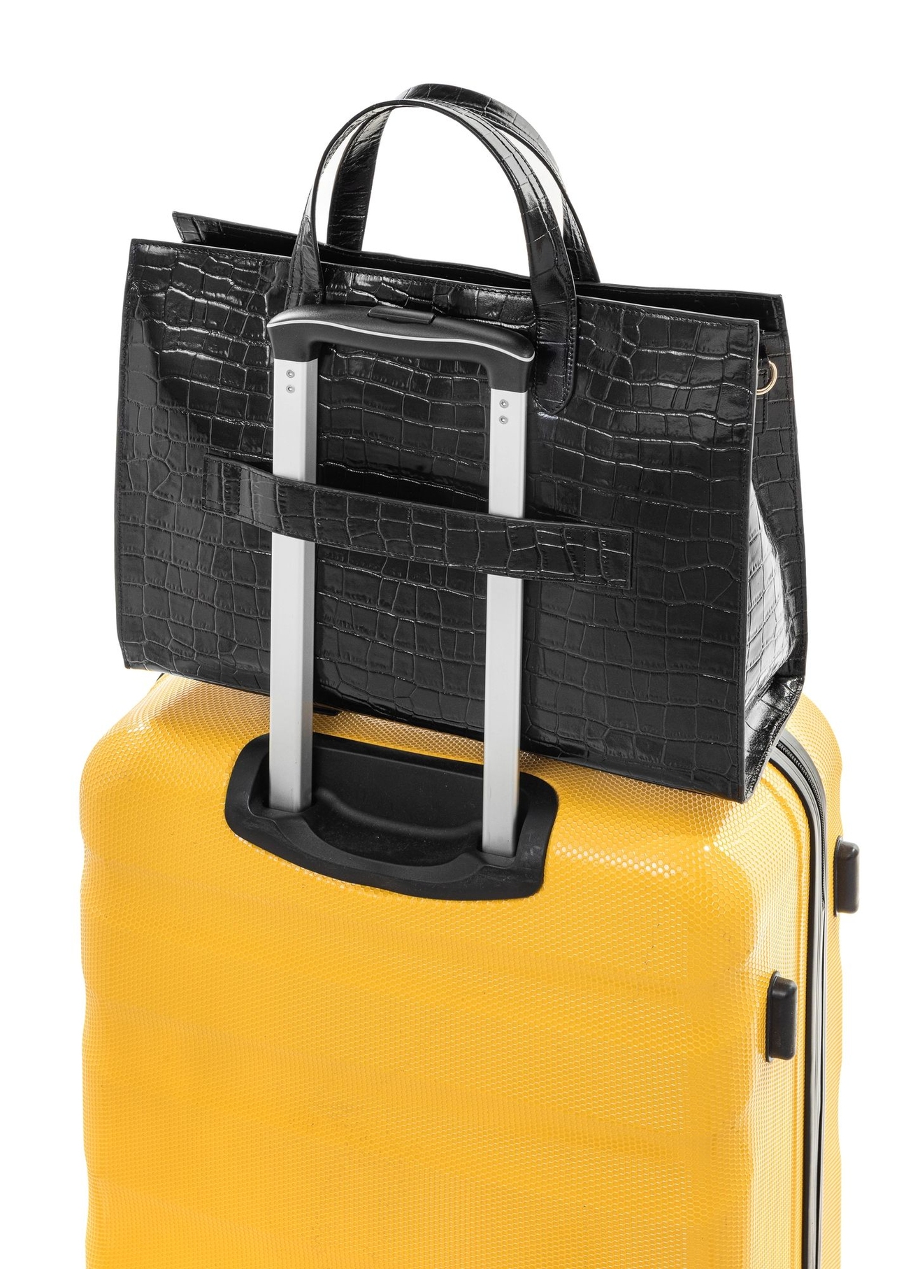 Black large croco leather handbag TORES-1132-9G(Z26) - product view on the suitcase, on a white background.