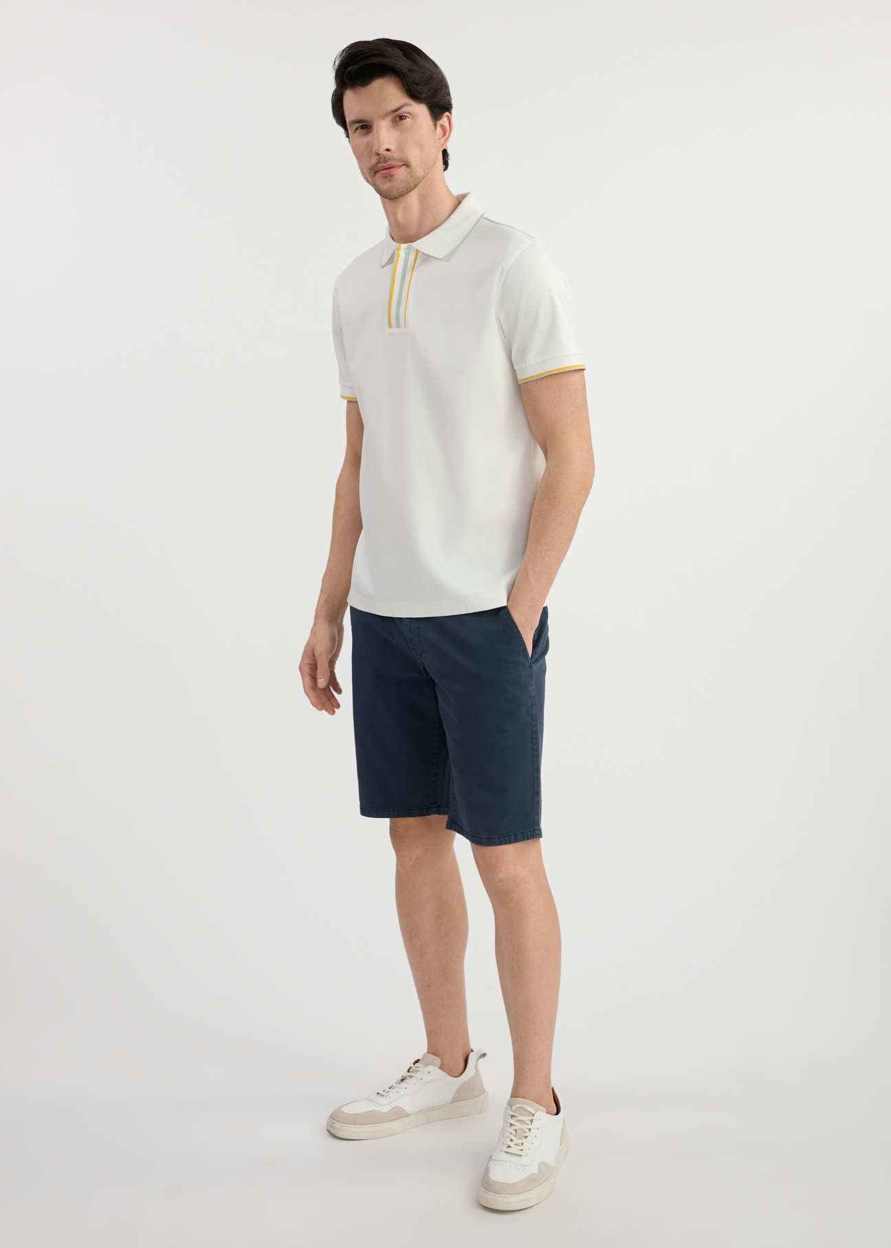 Cream men's polo shirt POLMT-0073-12(W25) - front view on model on white background. Full silhouette visible.