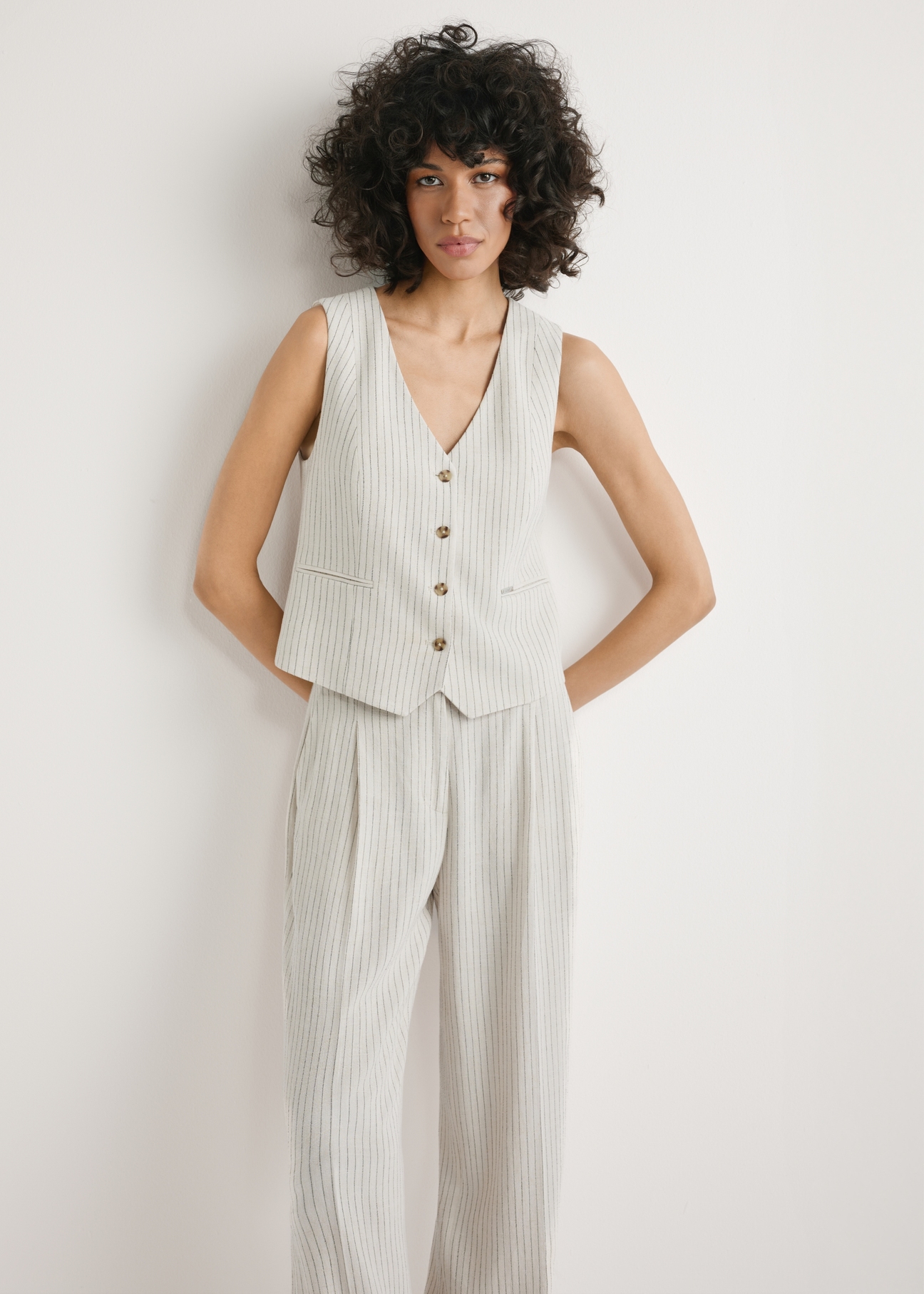 Women's viscose vest KAMDT-0037-0P(W26) - front view of the product, on a model, against a light background. Knee-length silhouette visible.