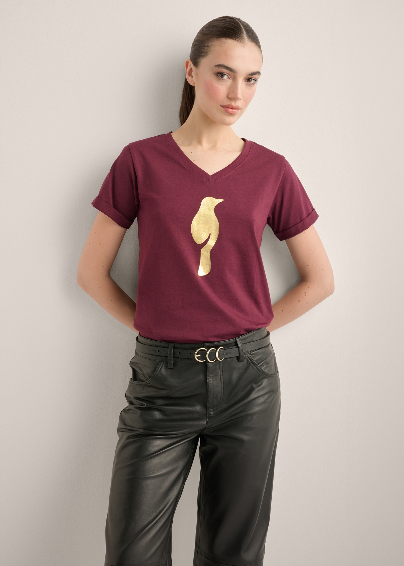 Women's burgundy T-shirt TSHDT-0149-4D(Z26), front view of the product on the model. Half of the silhouette visible.