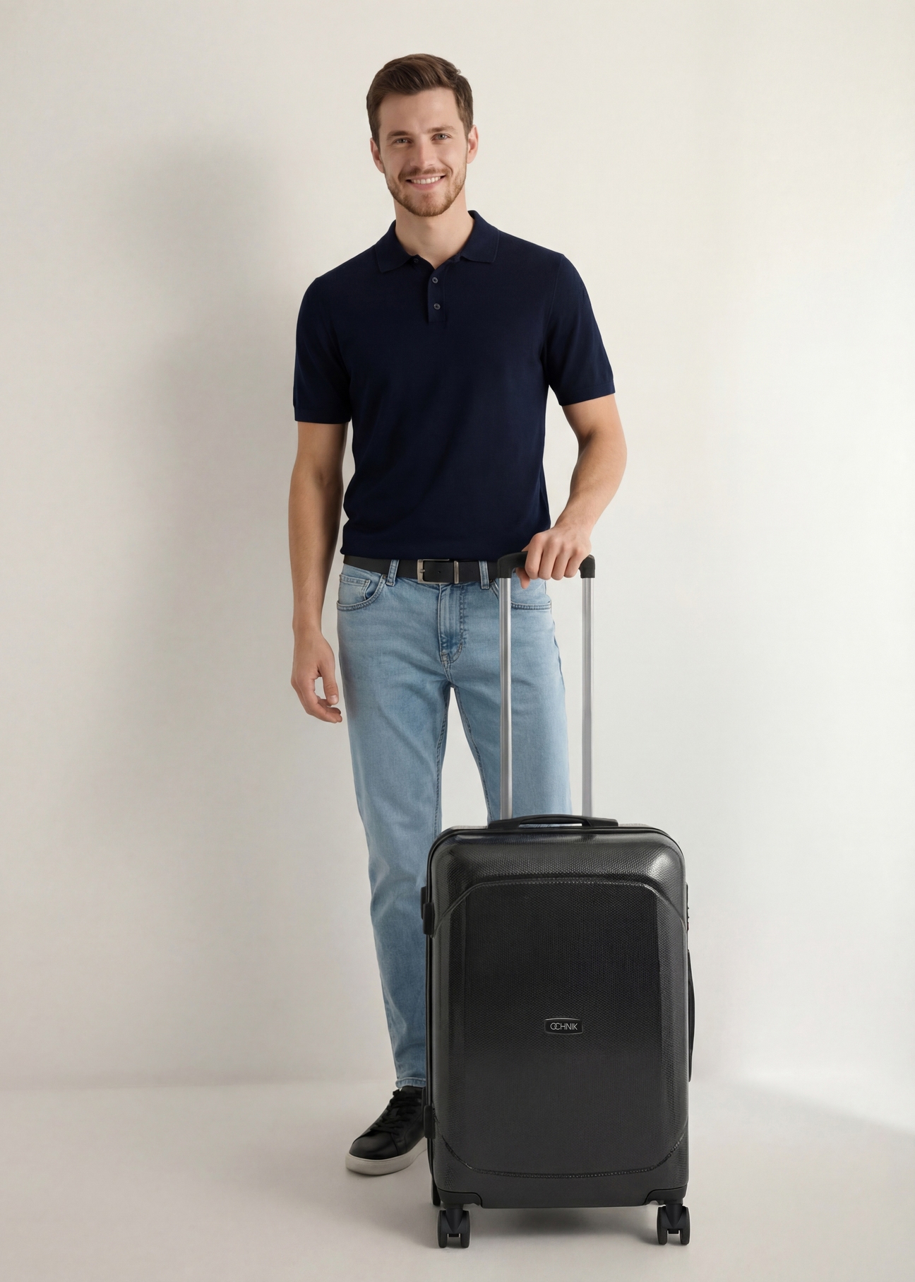 Medium suitcase on wheels WALPC-0014-99-24(W26), front view of the product next to the model's silhouette.