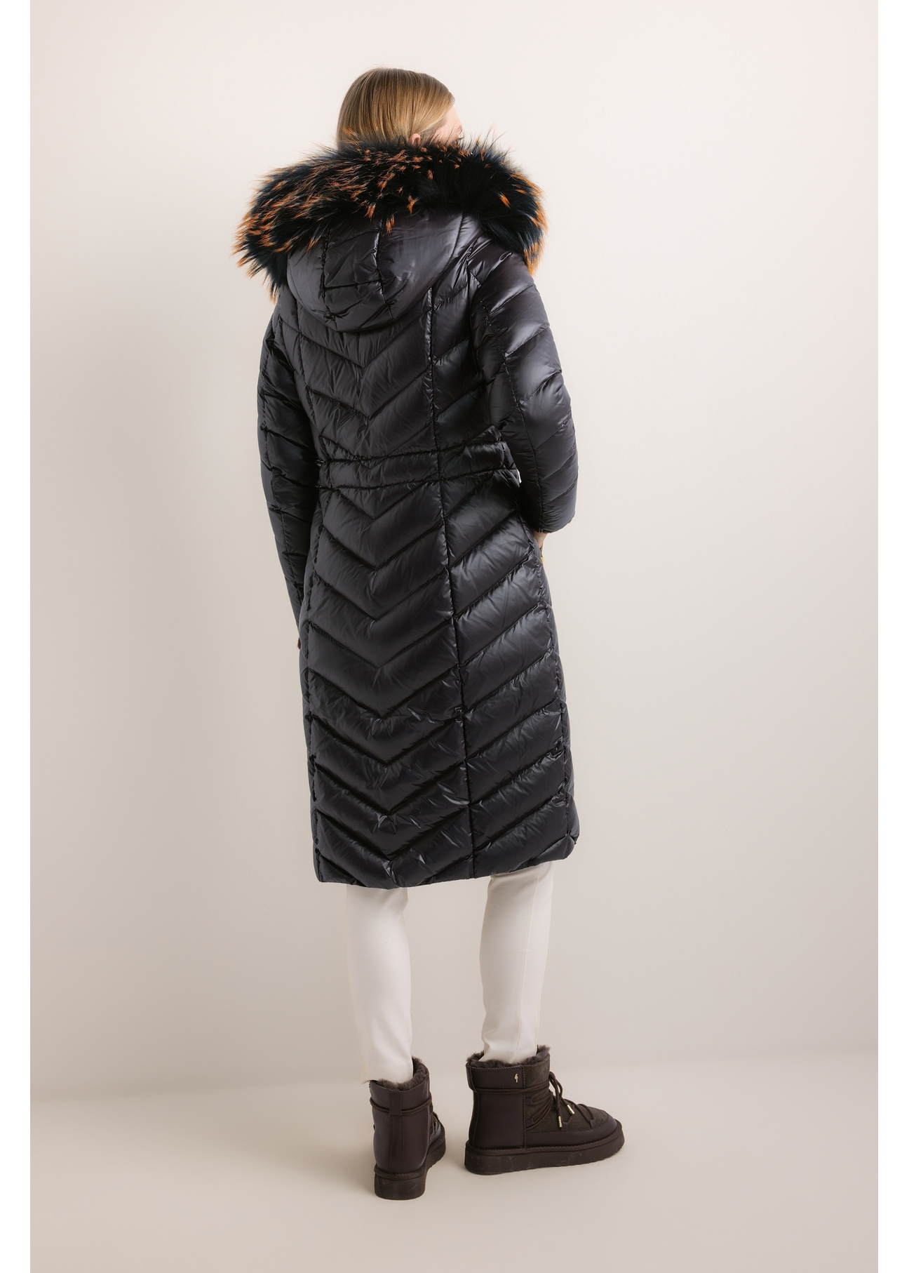 Women's jacket with raccoon fur (KURDT-0712-99(Z26)), rear view on a model. Full-body shot.