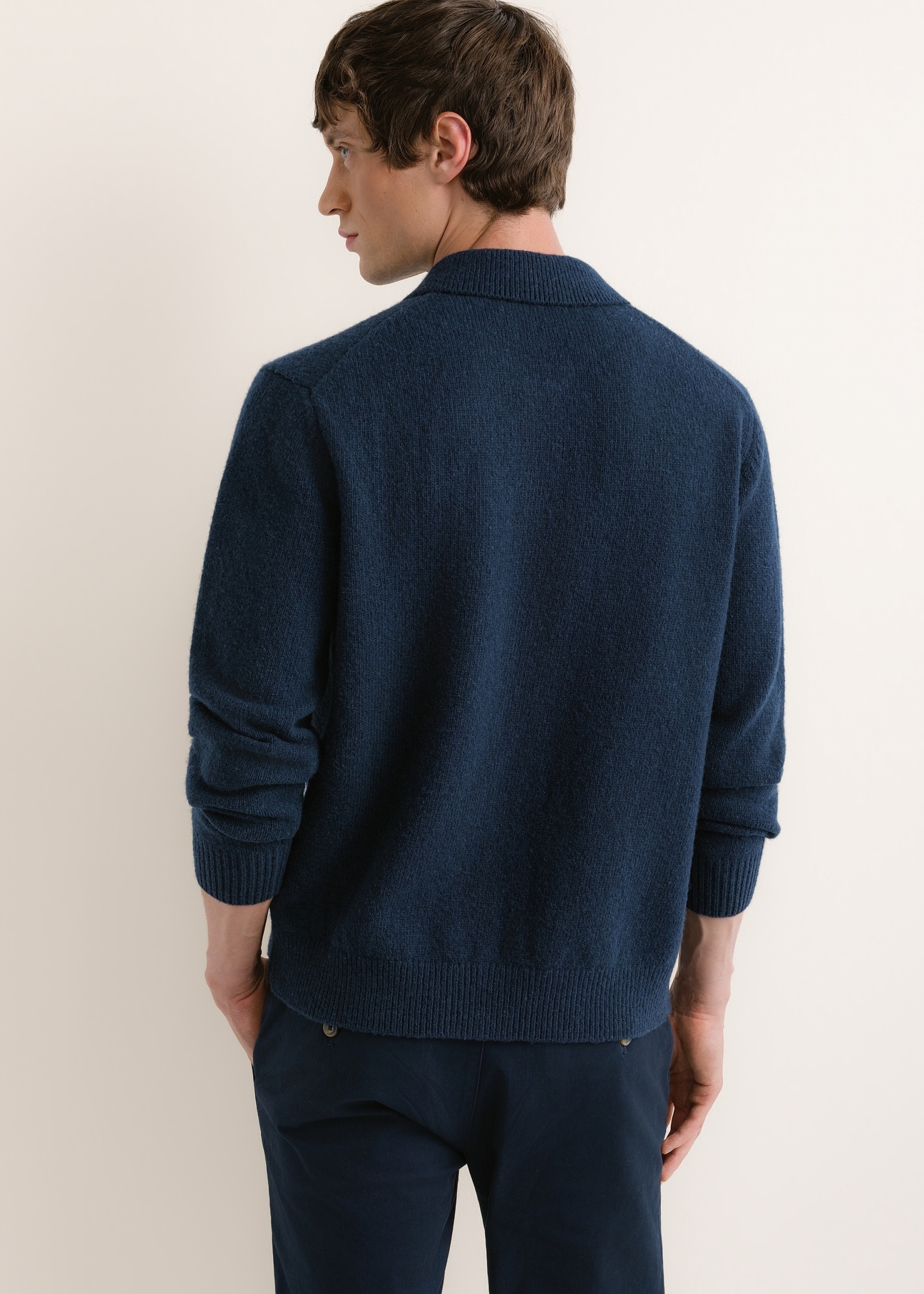 Men's dark navy wool-blend sweater KARMT-0007-7E(Z26), rear view on a model. Half of the figure is visible.