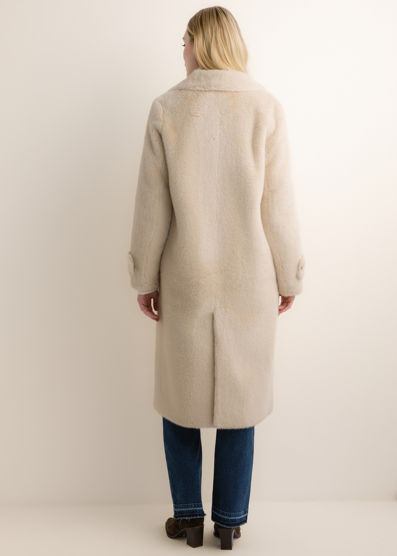 Women's beige long fur coat FUTDP-0080-1B(Z26), back view of the product on the model. The entire silhouette is visible.