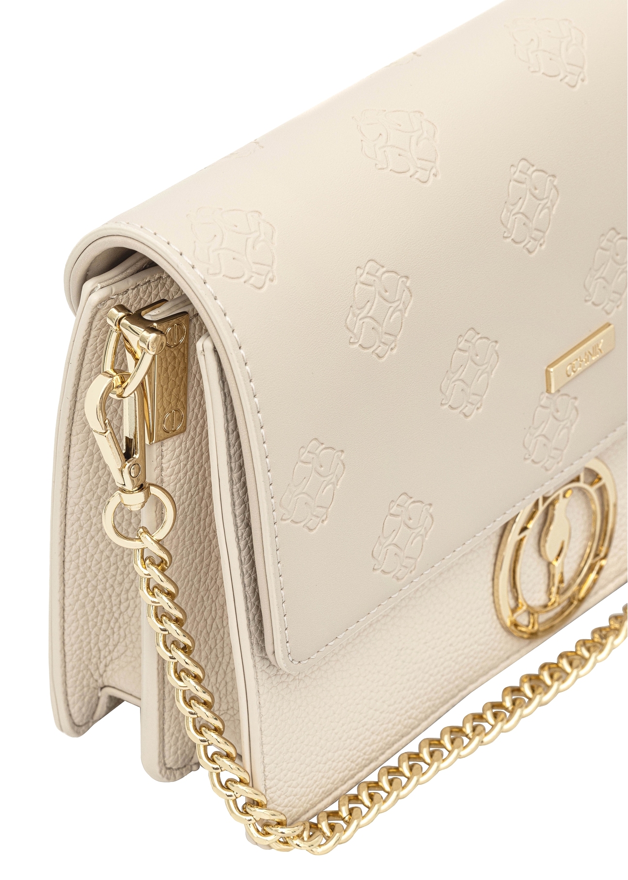 Cream women's handbag with monogram TOREC-0536-0B(W26), close-up of product detail, view on white background.