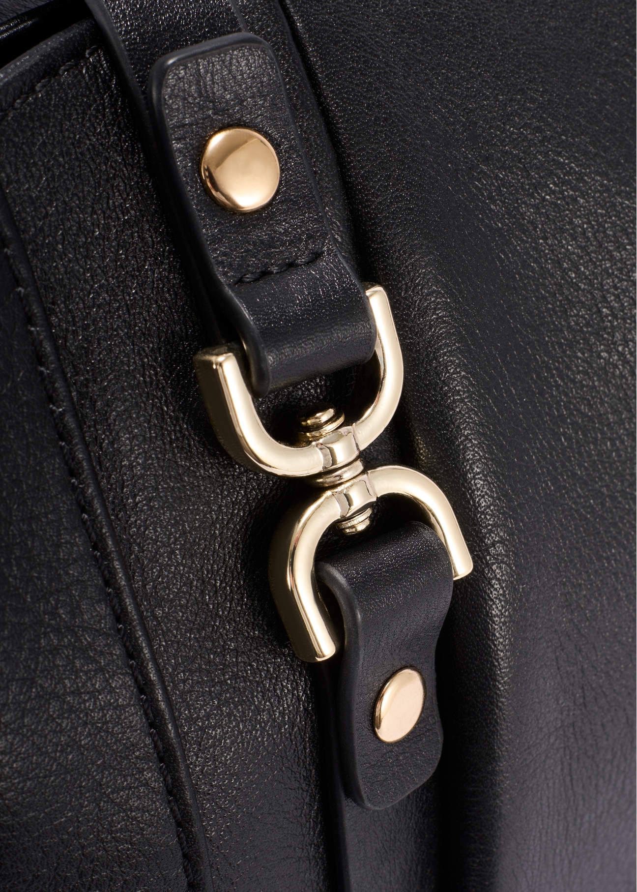 Black leather shopper bag TORES-1223-99(W26), close-up of product detail on white background.