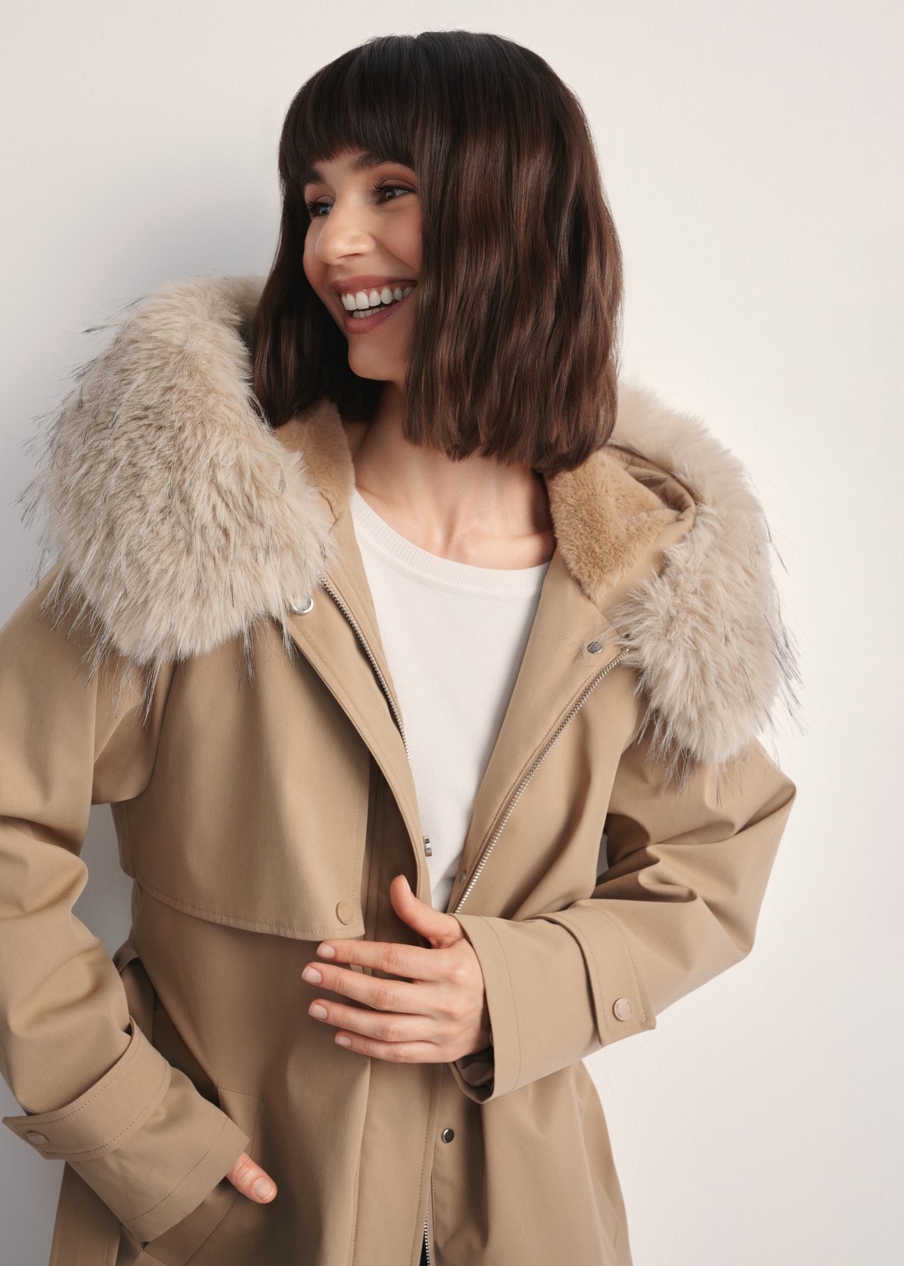 Beige women's winter jacket KURDT-0613-81(Z25) - front product view, on model against white background. Close-up of details.
