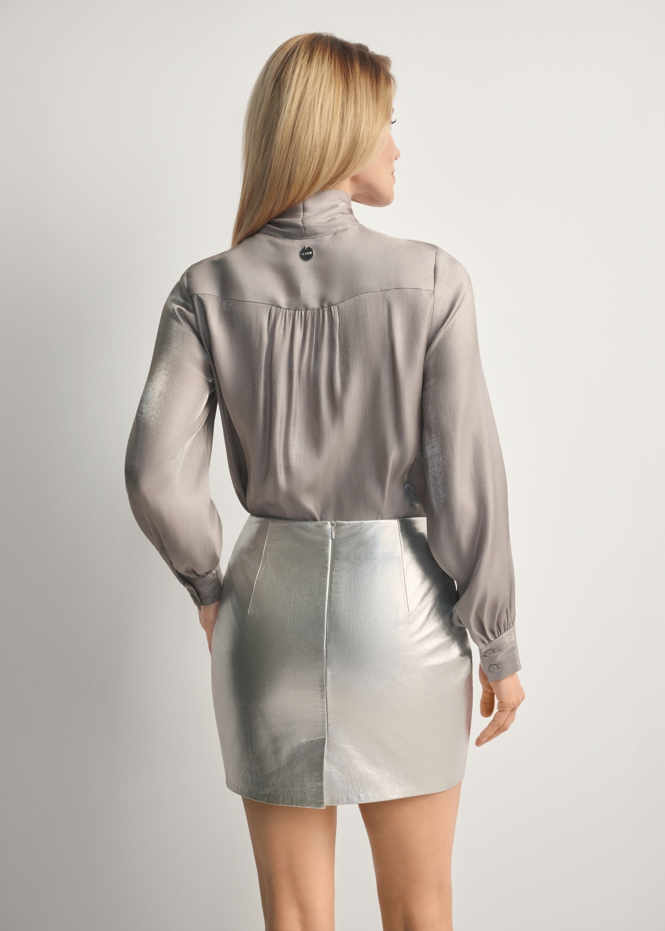 Silver women's blouse with ties BLUDT-0192-91(Z25), product view from the back on the model, half of the silhouette visible.