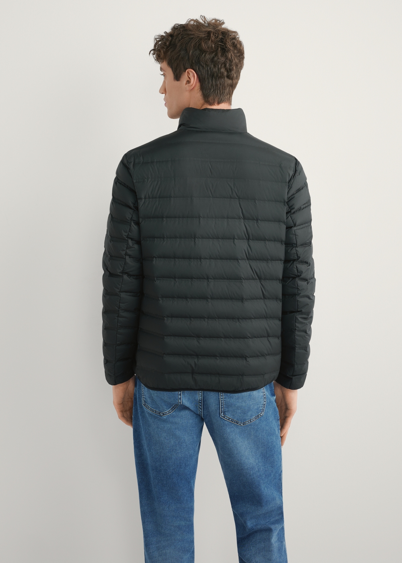 Men's transitional quilted jacket KURMT-0412-99(W26), product view from the back on the model, half of the silhouette visible.