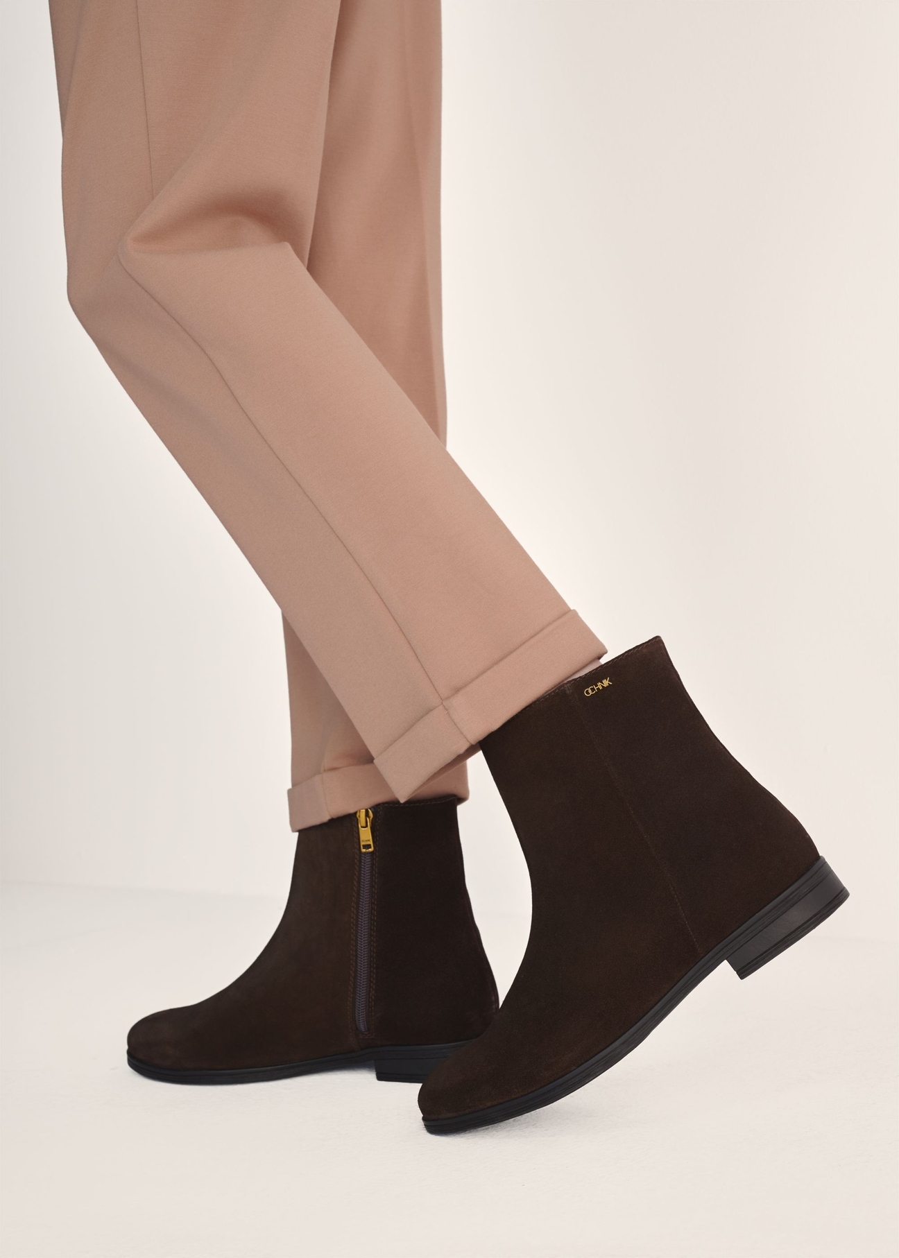 Dark brown suede women's ankle boots BUTYD-1193-1I(Z26), product view on model's feet against a light background.