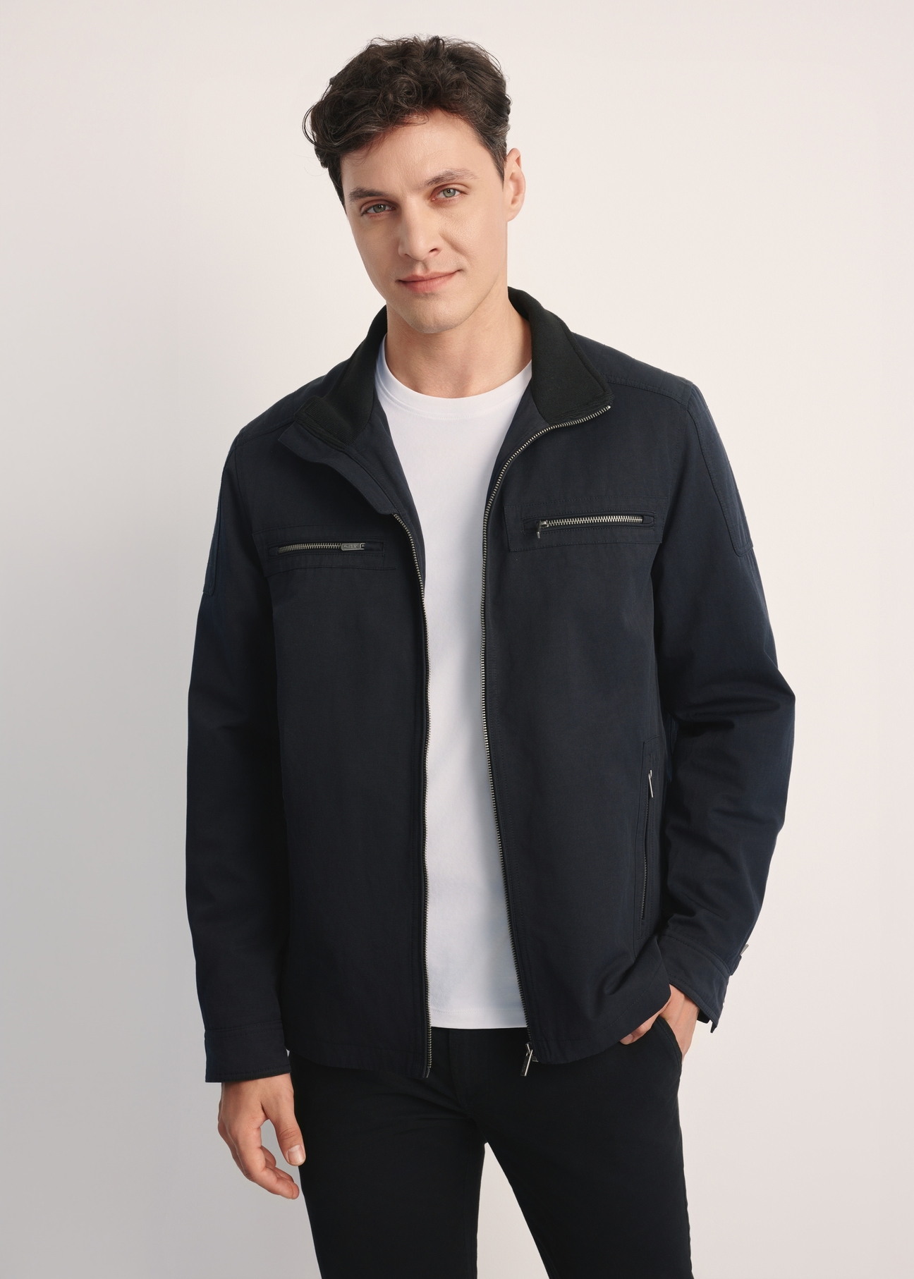 Men's navy blue transitional jacket KURMT-0384-69(Z25), product visible from the front on the model, half of the silhouette visible.