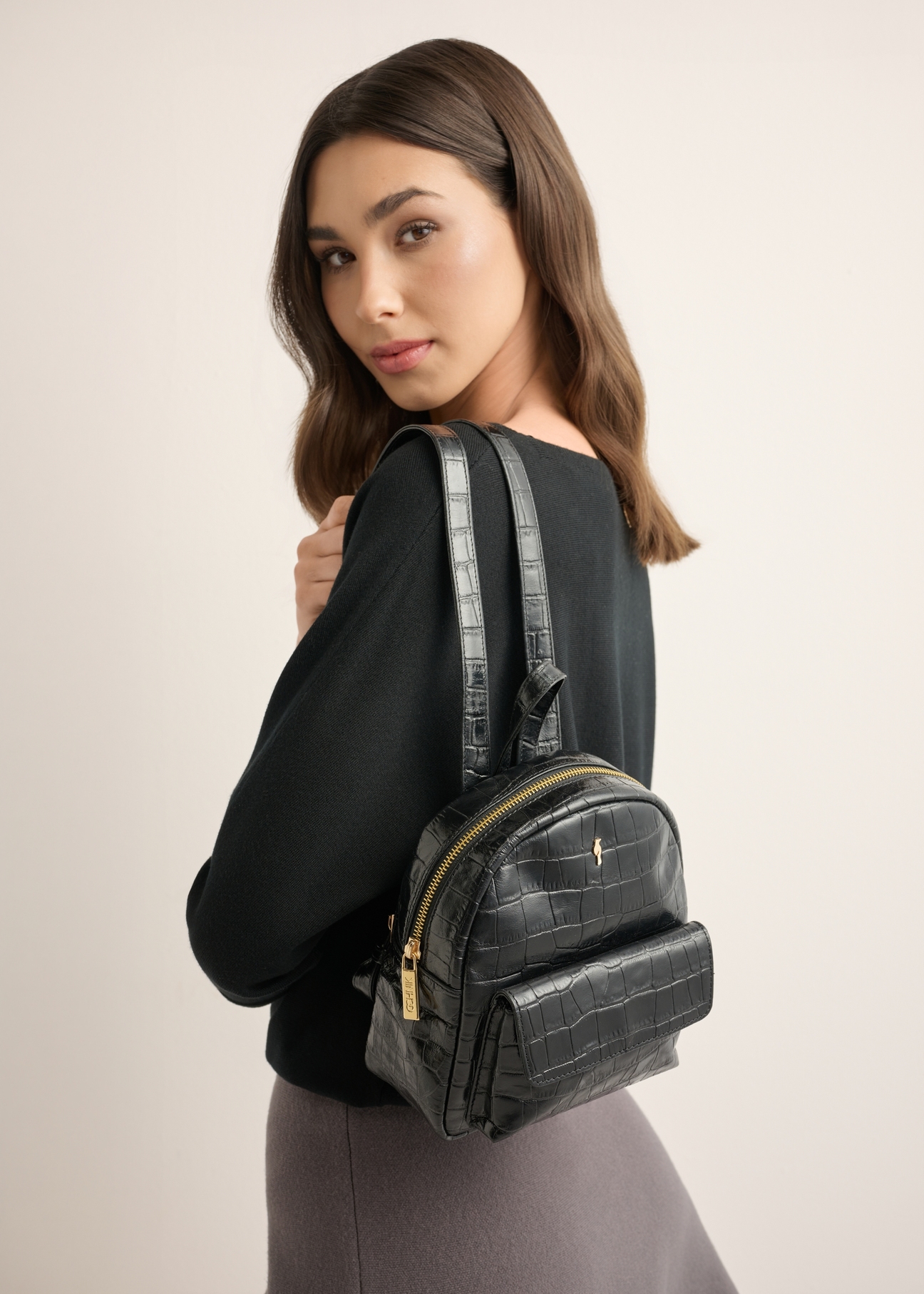 Black leather croco women's backpack TORES-1323-9G(Z26), product view on a model's silhouette, on a light background.