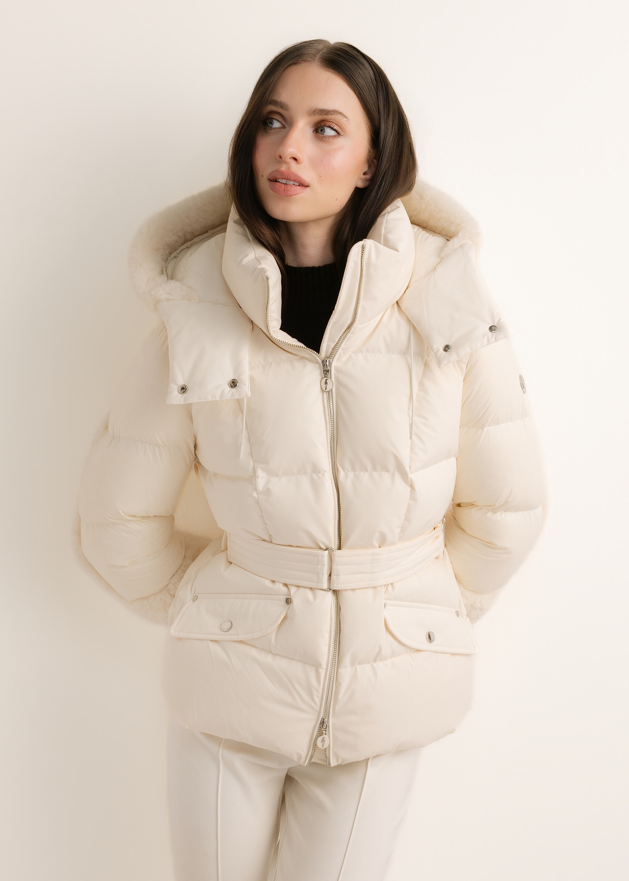 Light beige women's winter jacket KURDT-0705-1A(Z26); front view of the product on a model. Half-body shot.