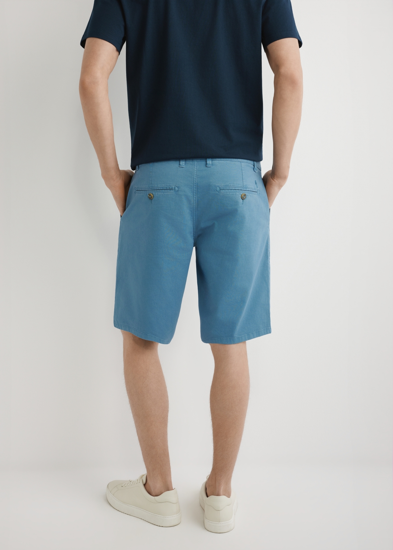 Men's blue shorts SZOMT-0029-7B(W26), back view of the product on the model. Half of the silhouette visible.