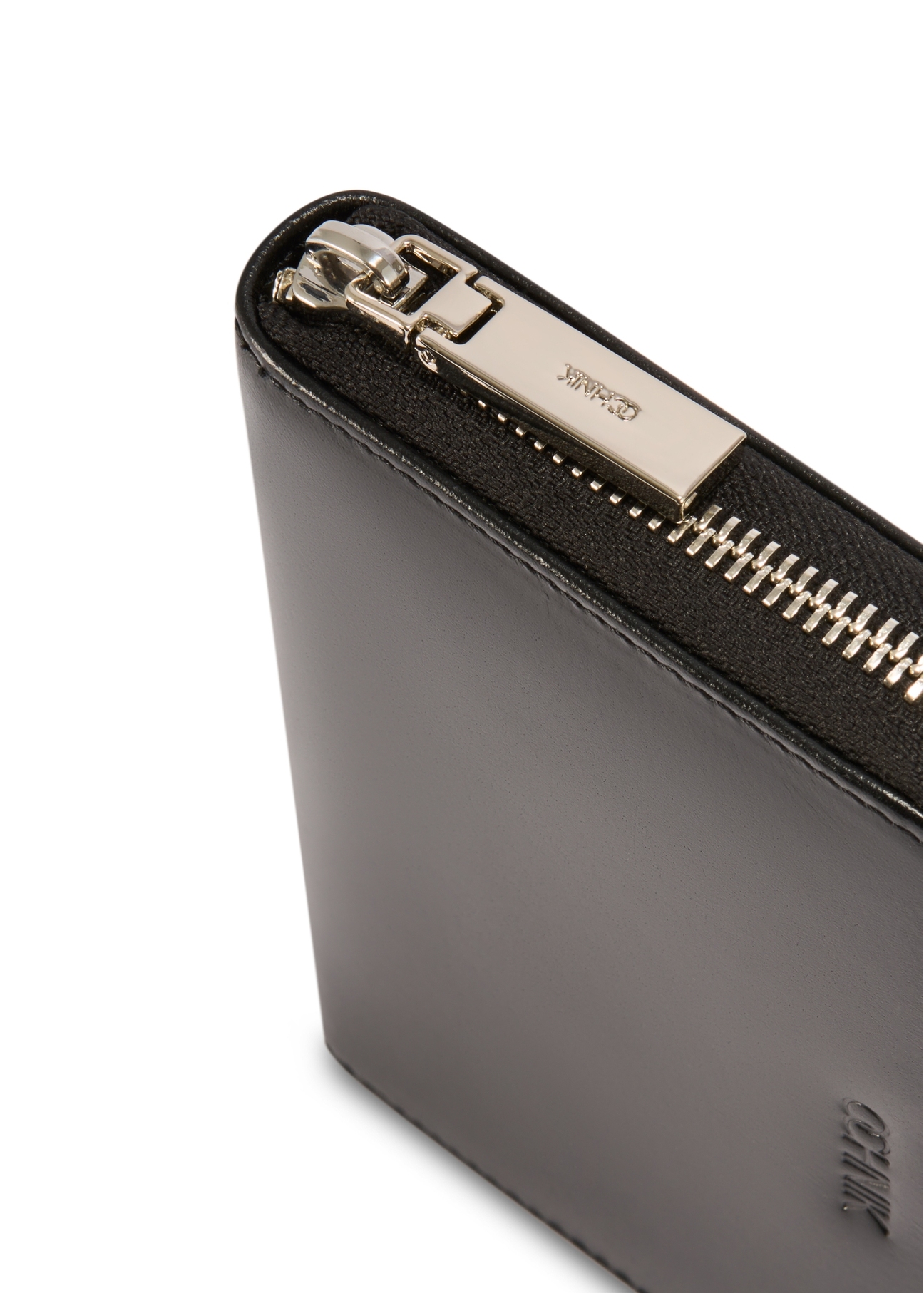 Black leather women's wallet PORES-0976-99(Z25), close-up of product detail, view on white background.