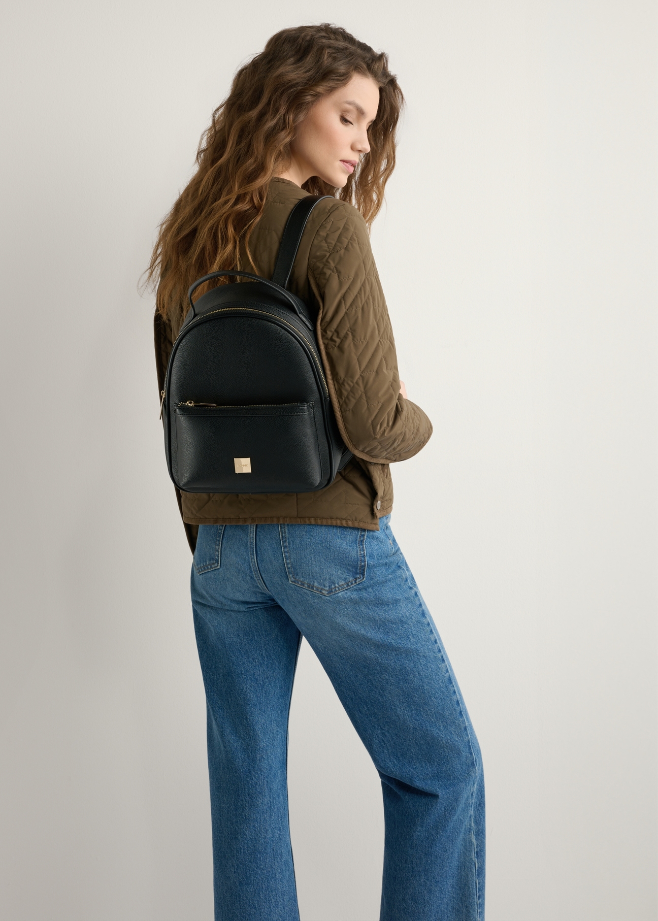 Women's black imitation leather backpack TOREC-0920-99(W26)