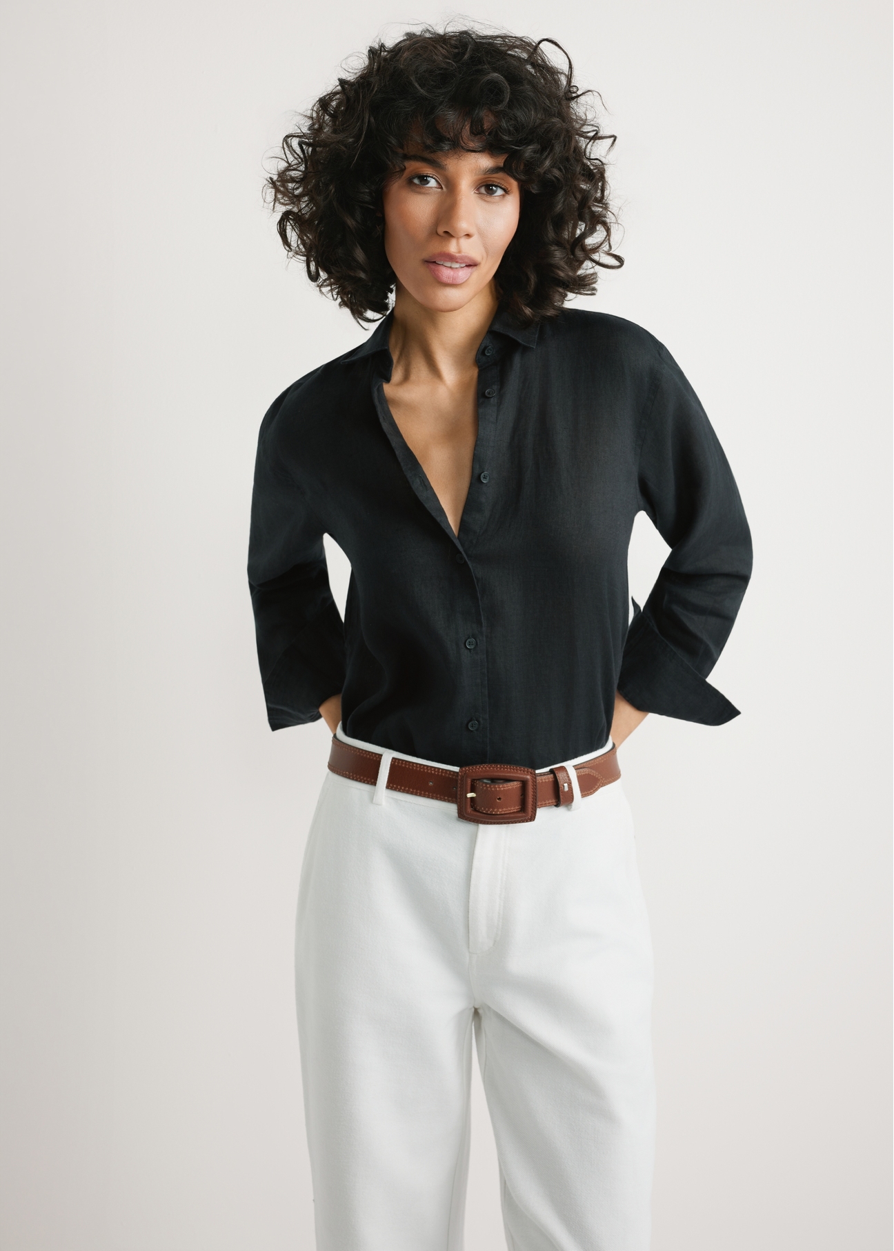Women's black linen shirt KOSDT-0163A-99(W26) - front view of the product, on a model, against a light background. Knee-length silhouette visible.