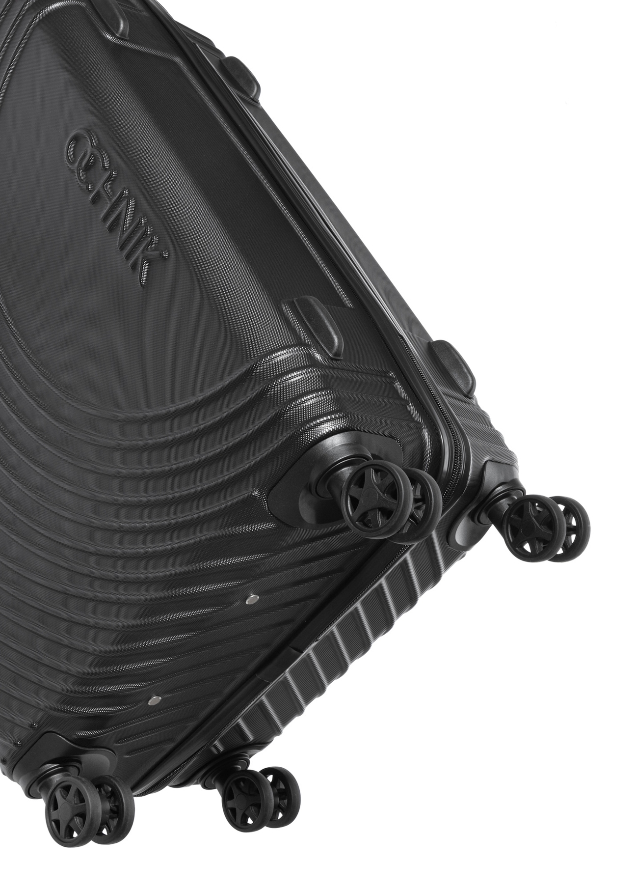 Medium wheeled suitcase WALAB-0088-99-24(W26), close-up of the wheels against a white background.