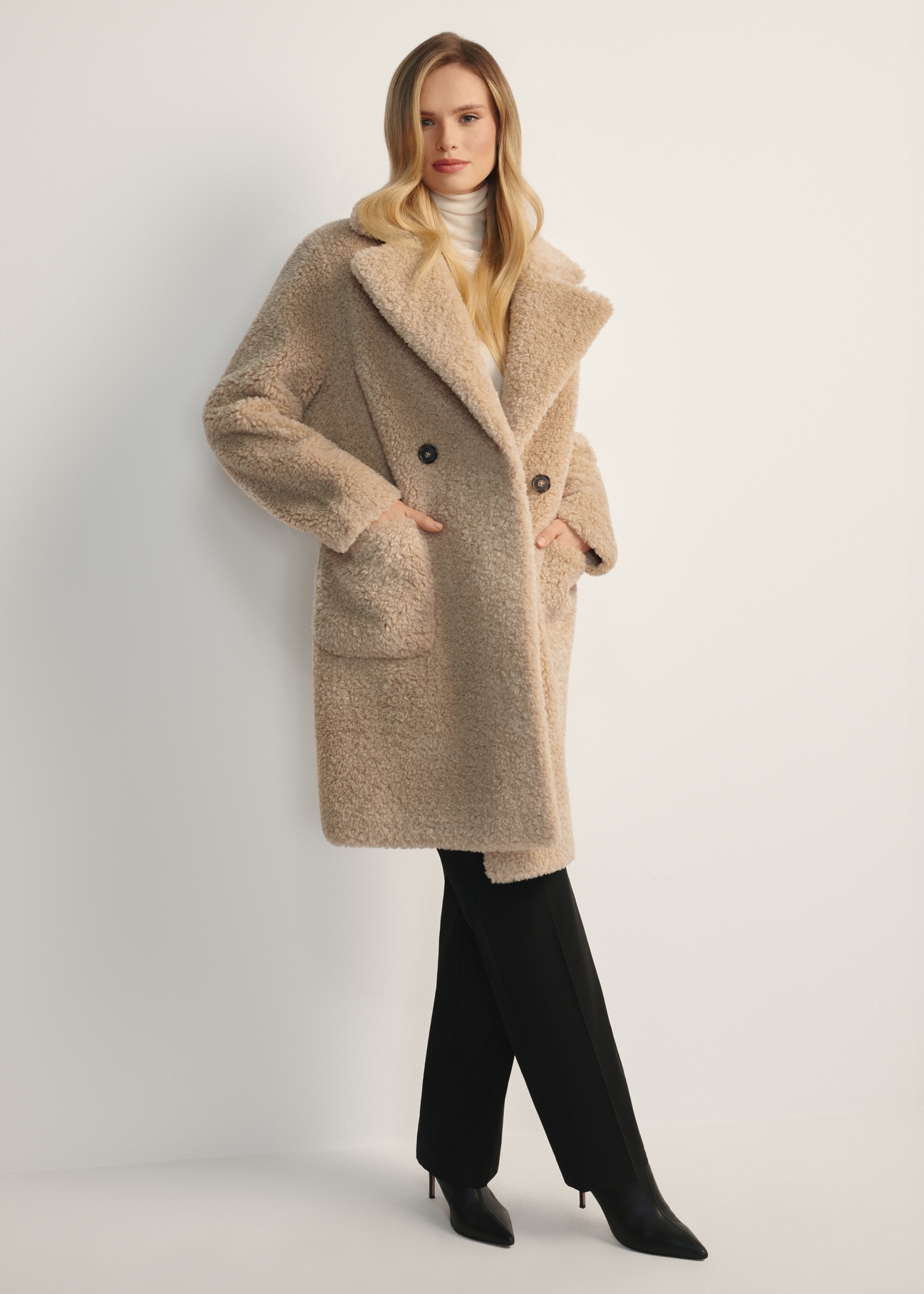 Women's fur coat with double-breasted fastening FUTDP-0018-81(Z25), product view from the front on the model, the entire silhouette is visible.