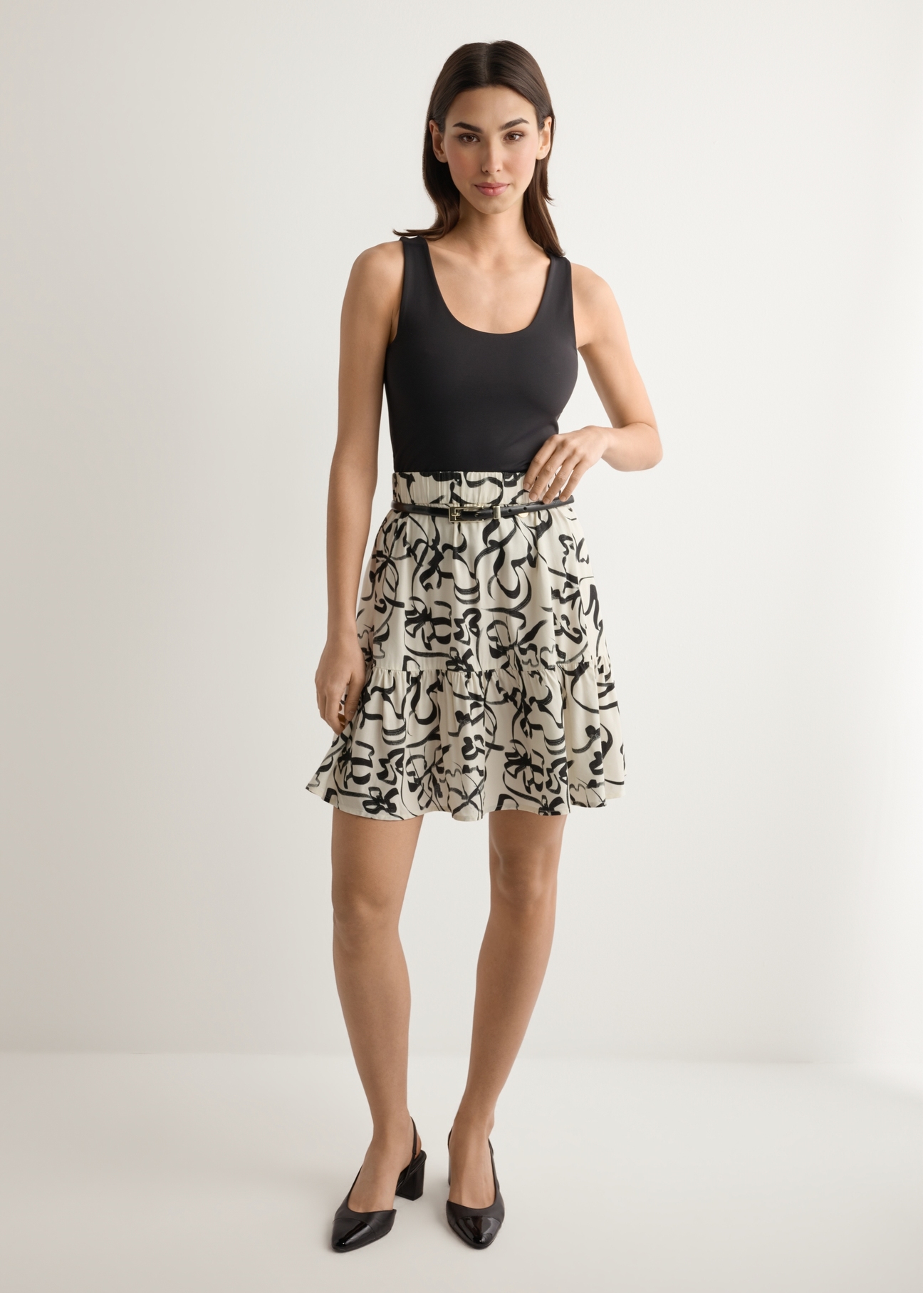 Women's cream patterned skirt SPCDT-0128-1P(W26), front view of the product on the model. Full body visible.