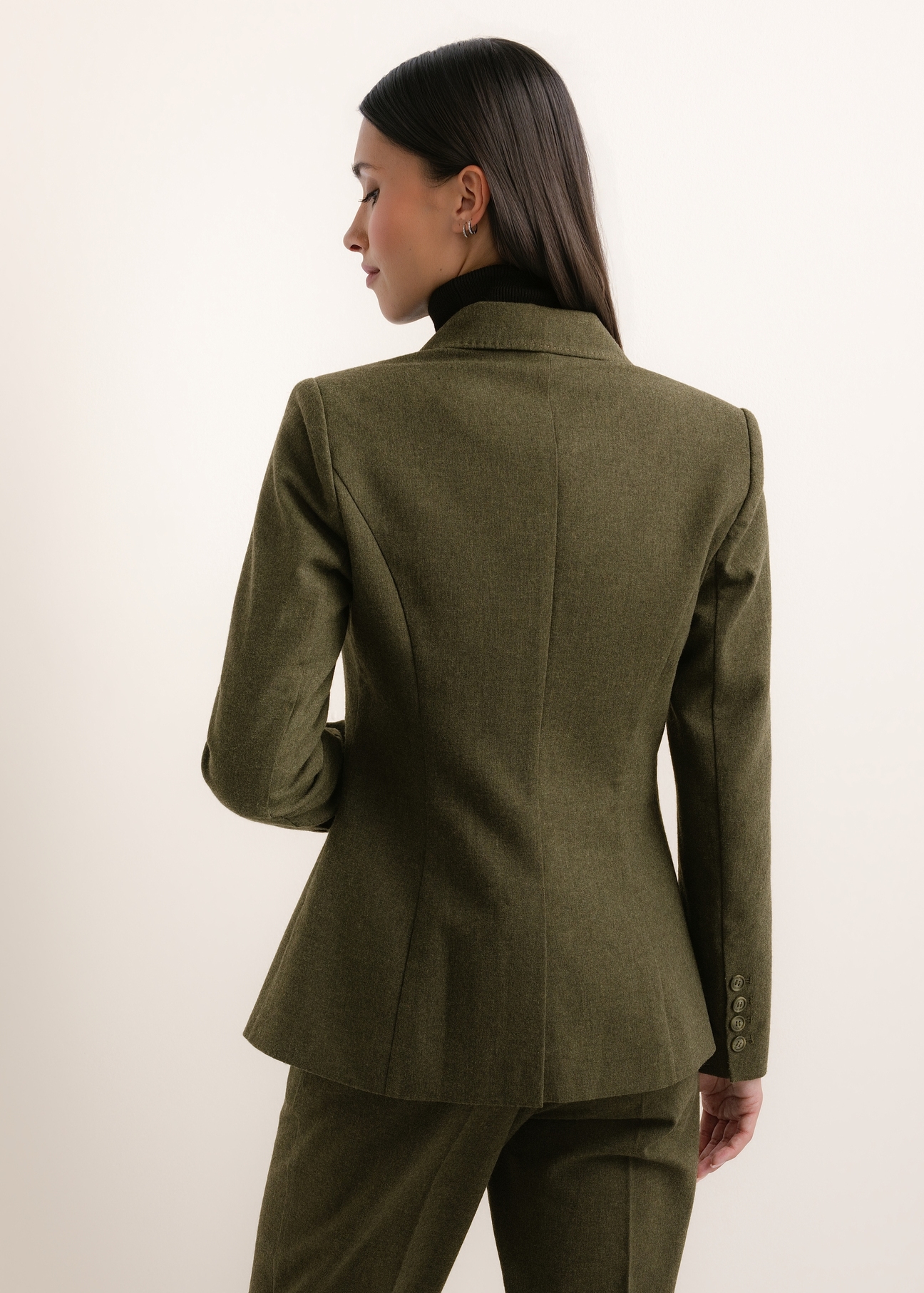 Green women's jacket with wool ZAKDT-0057-8B(Z26), back view of the product on the model. Half of the silhouette visible.