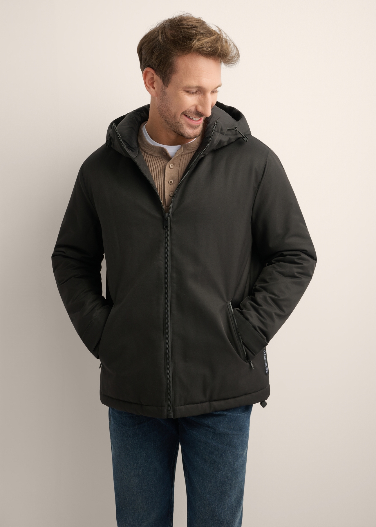 Black men's transitional jacket KURMT-0436-99(Z26), front product view on model. Half silhouette visible.