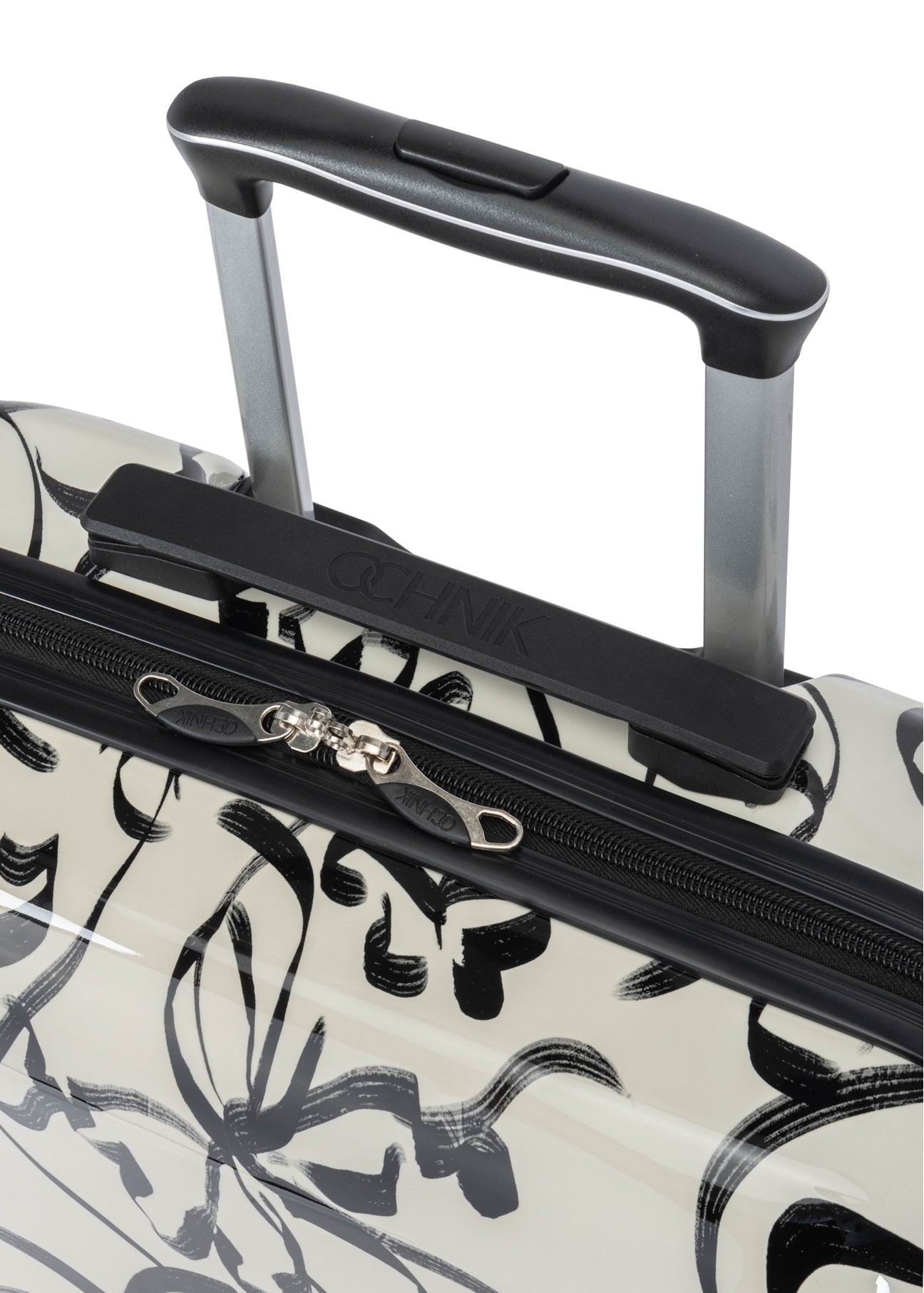 Small patterned suitcase on wheels WALAB-0074-1P-19(W26), view of the product handle on a white background.