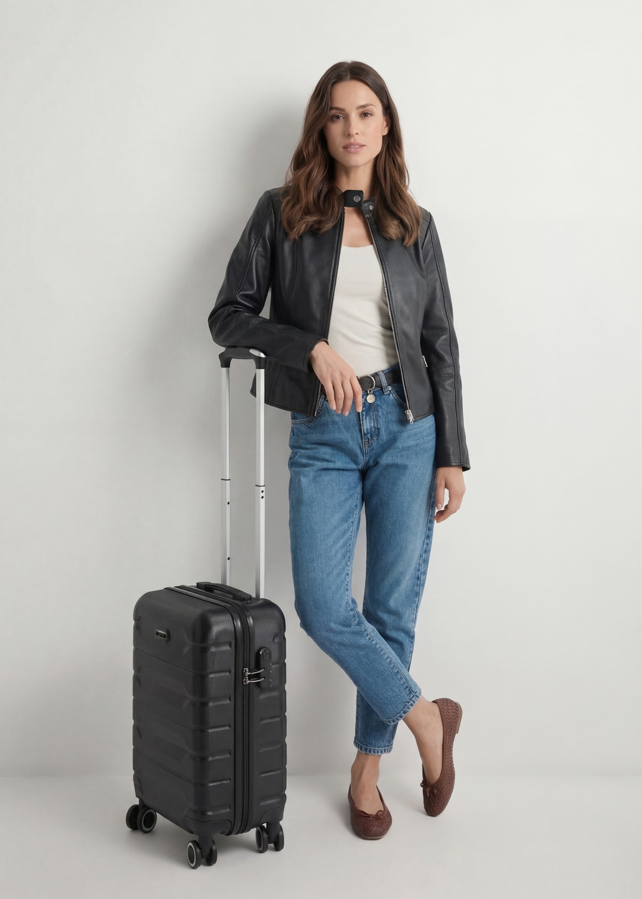 Small suitcase on wheels WALAB-0067-99-19(W25), product view diagonally next to the model, the entire model is visible.