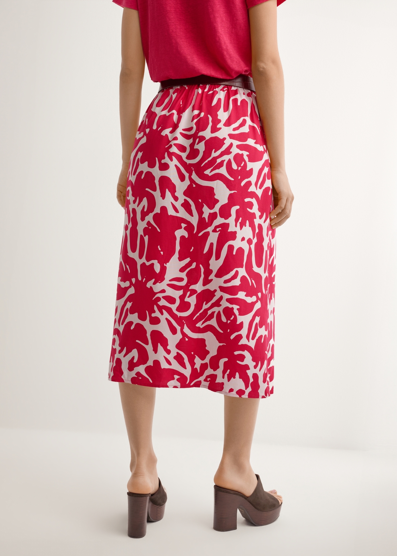 Pink viscose midi skirt SPCDT-0129-5P(W26), back view of the product on the model. Half of the silhouette visible.