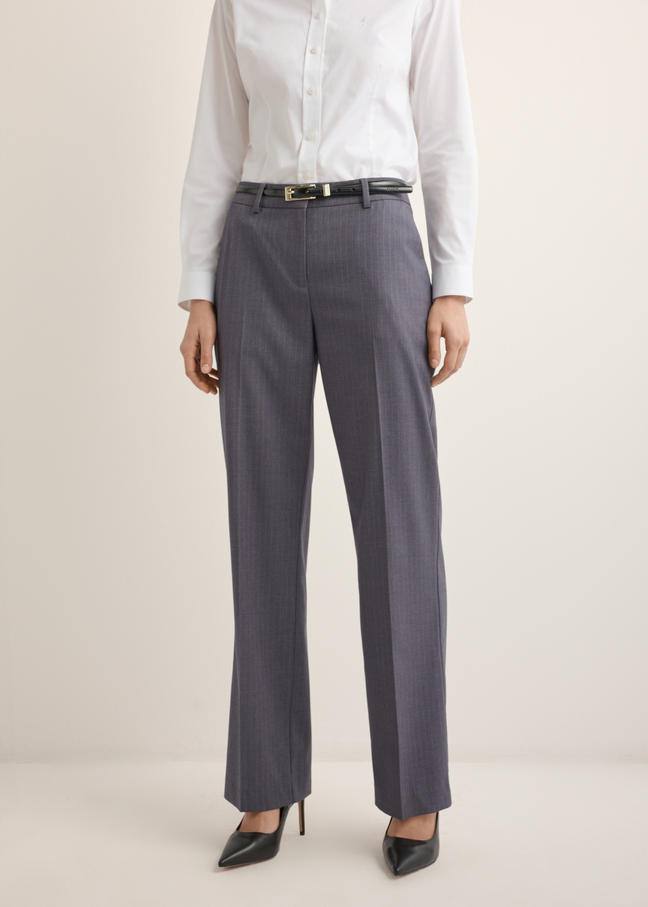 Women's gray pleated trousers SPODT-0125-9D(Z26), front view of the product on the model. Half of the silhouette visible.