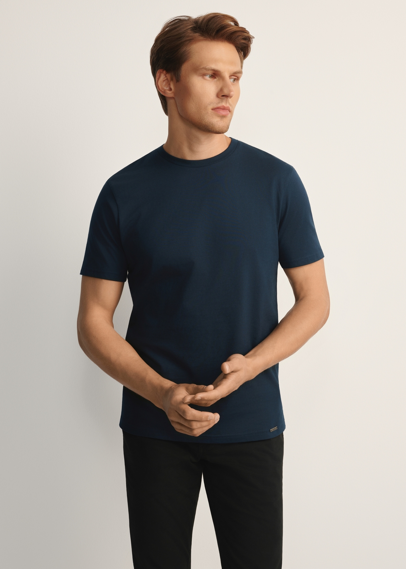 Navy blue cotton men's t-shirt TSHMT-0108-68(Z25), front view of the product on the model, half of the silhouette visible.