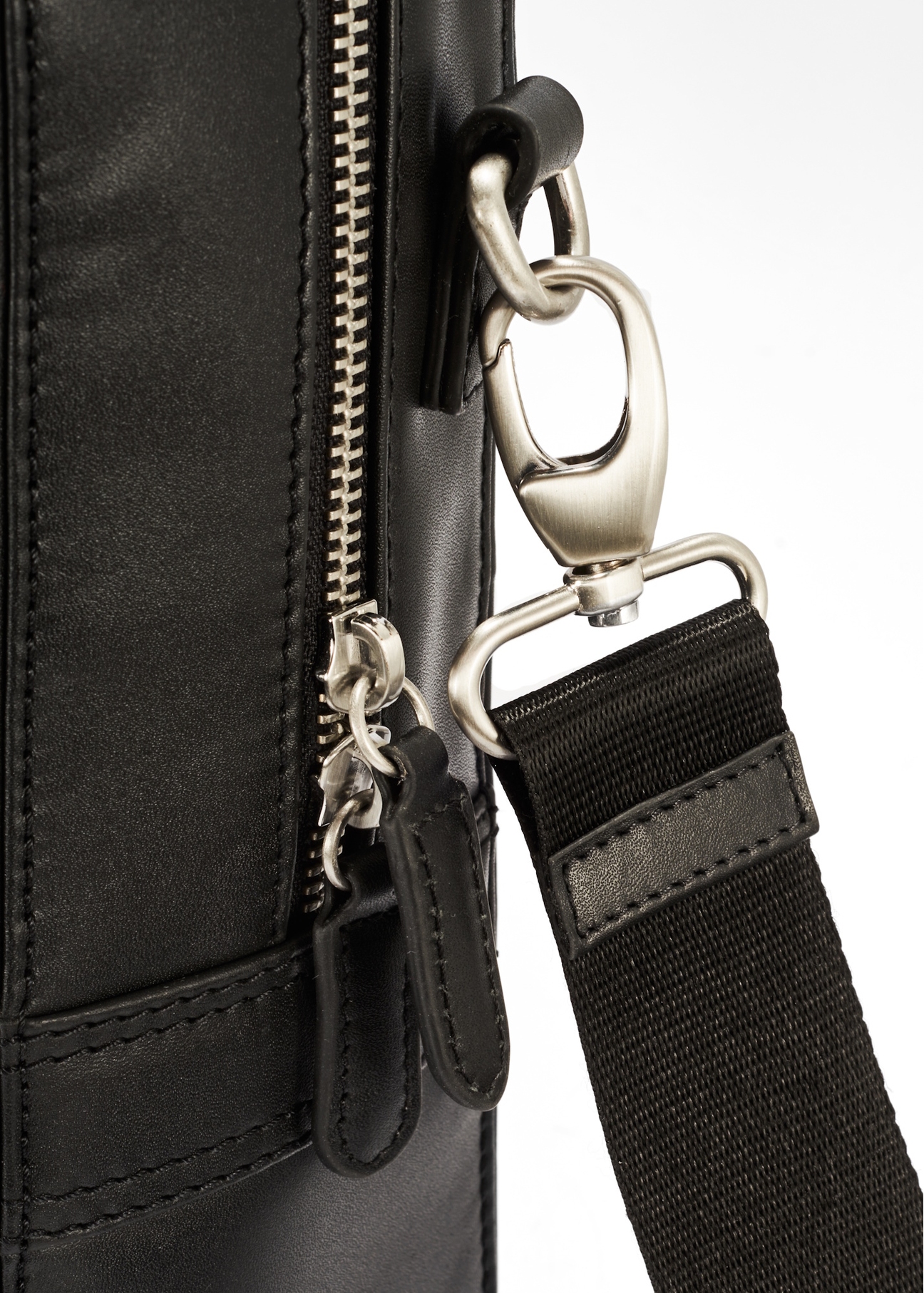 Roomy men's bag made of black leather TORMS-0471-99(Z25), close-up of the product detail on a white background.