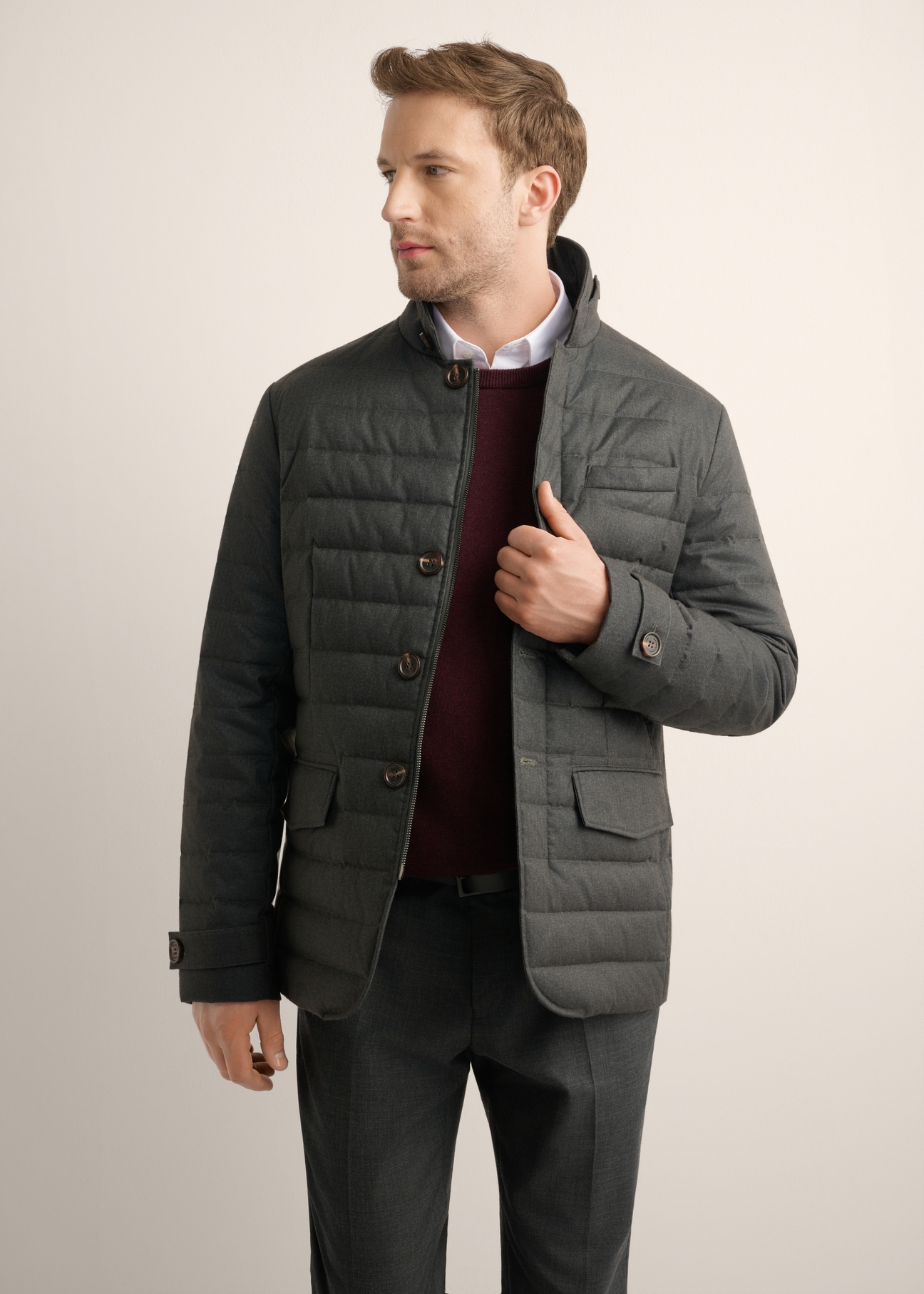 Gray men's jacket with natural insulation KURMT-0424-9C(Z26), front product view on model. Half silhouette visible.