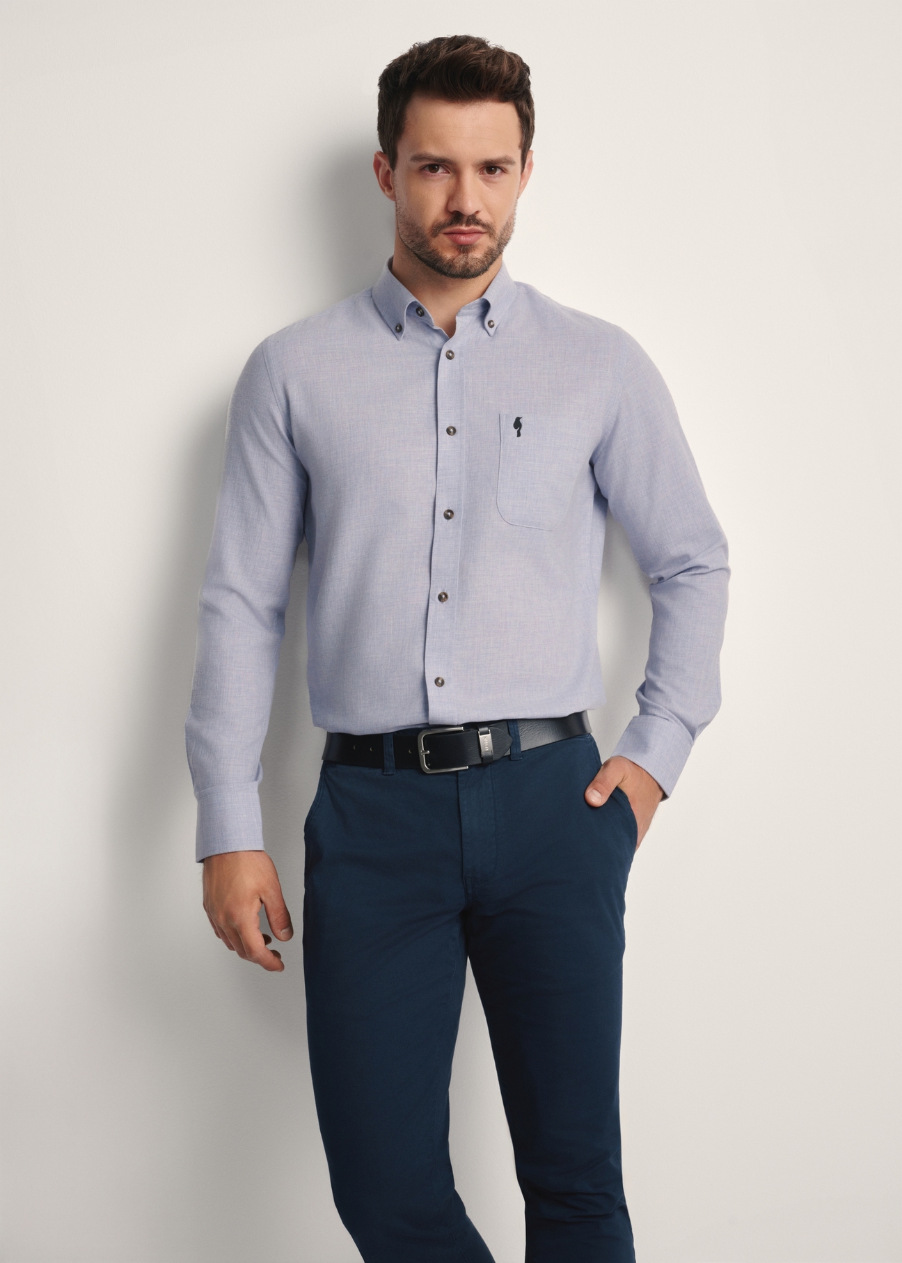 Blue cotton men's shirt KOSMT-0299A-62(Z25), front view of the product on the model. Half of the silhouette visible.