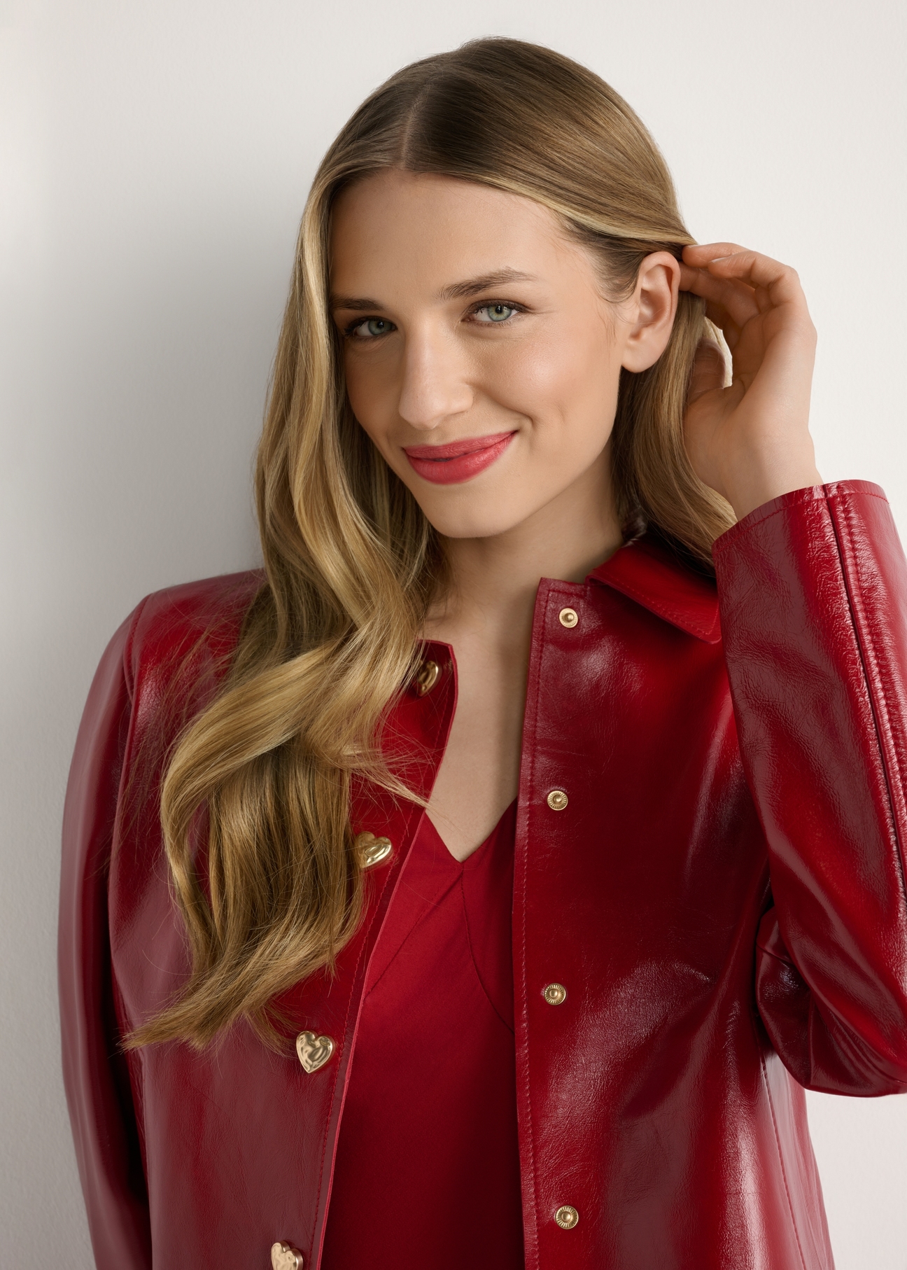 Red short women's jacket KURDS-0612-4B(W26), front view of the product on the model, close-up of the torso.