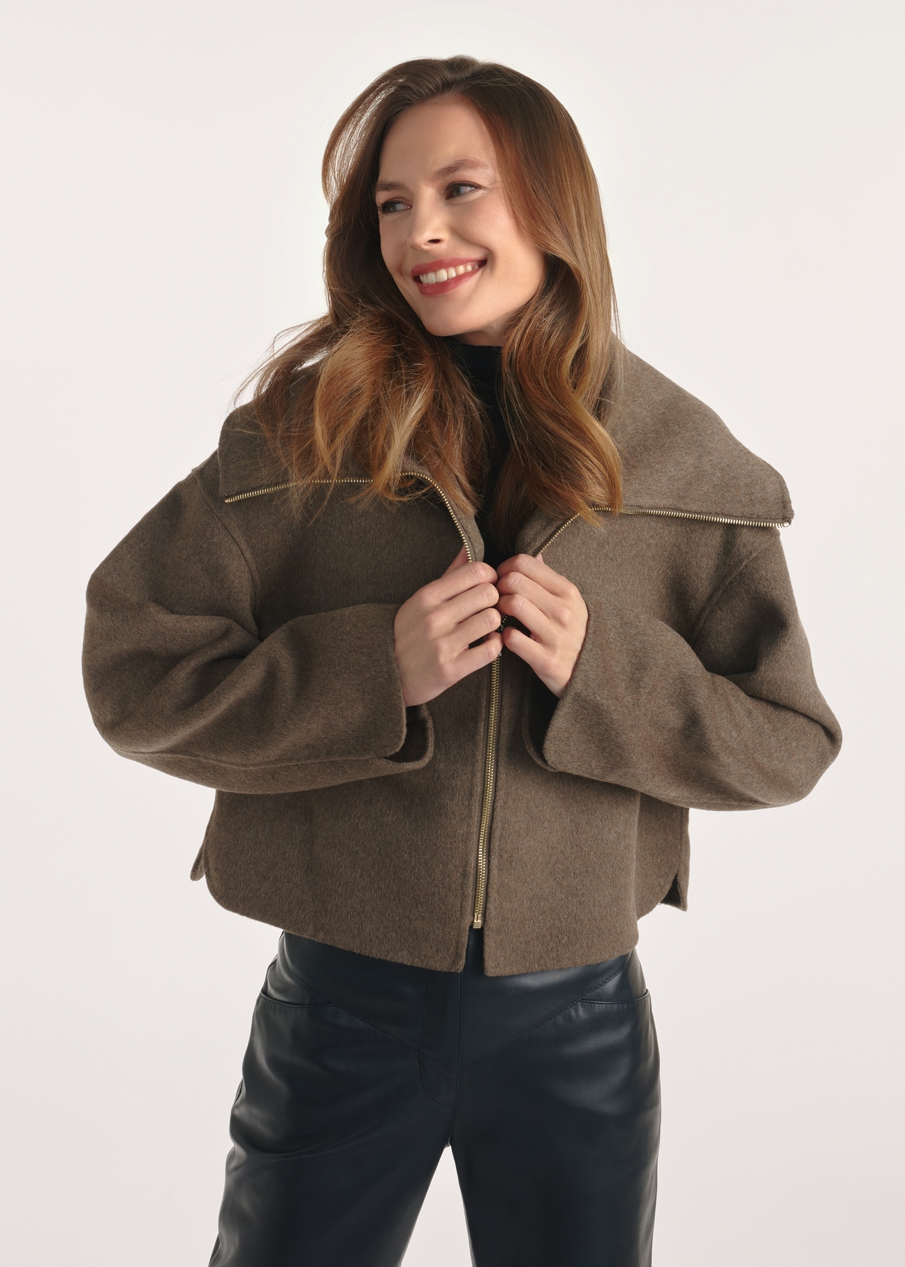Short women's coat in brown color PLADT-0066-89(Z25), front view of the product on the model, half of the silhouette visible.