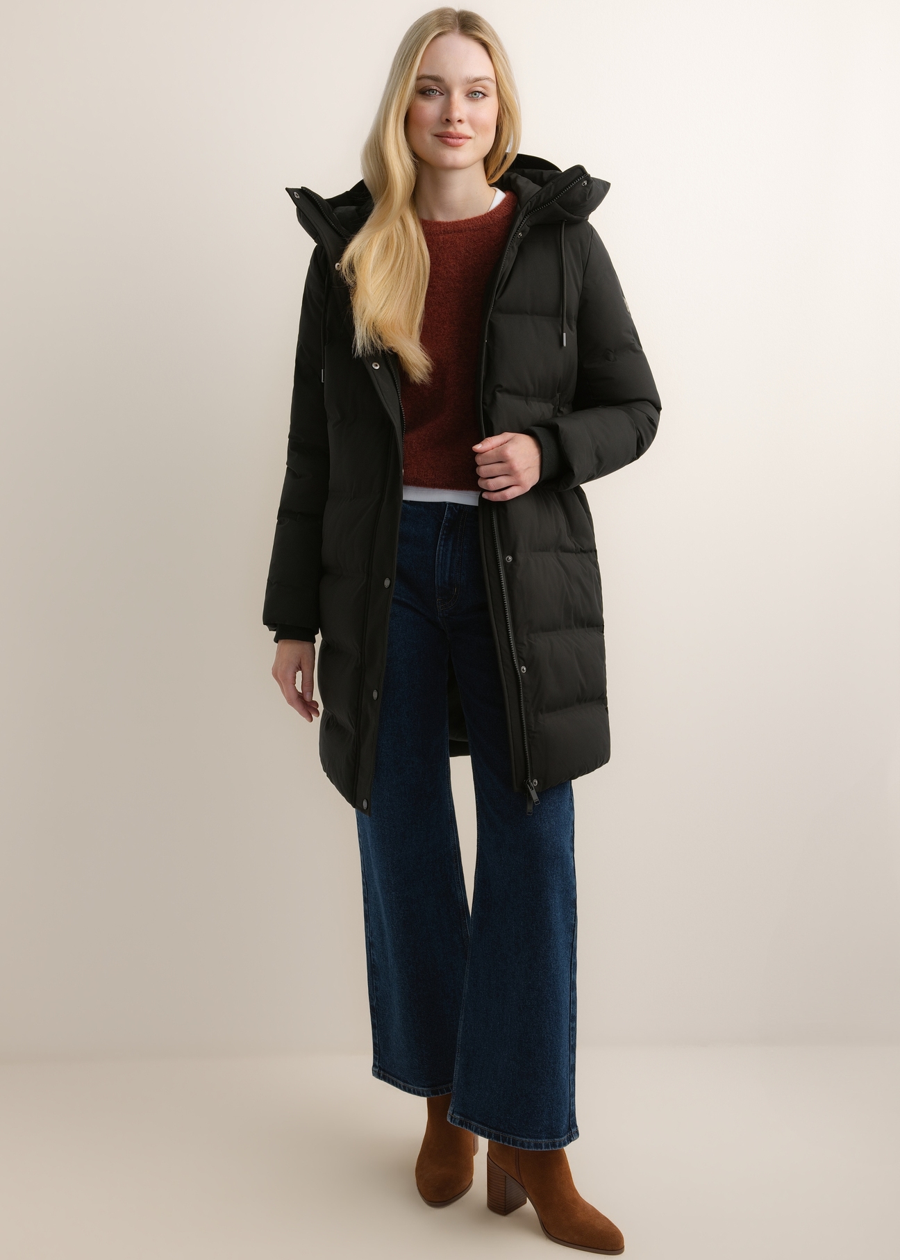 Black women's winter jacket with hood KURDT-0700-99(Z26), front product view on model. Full body visible.