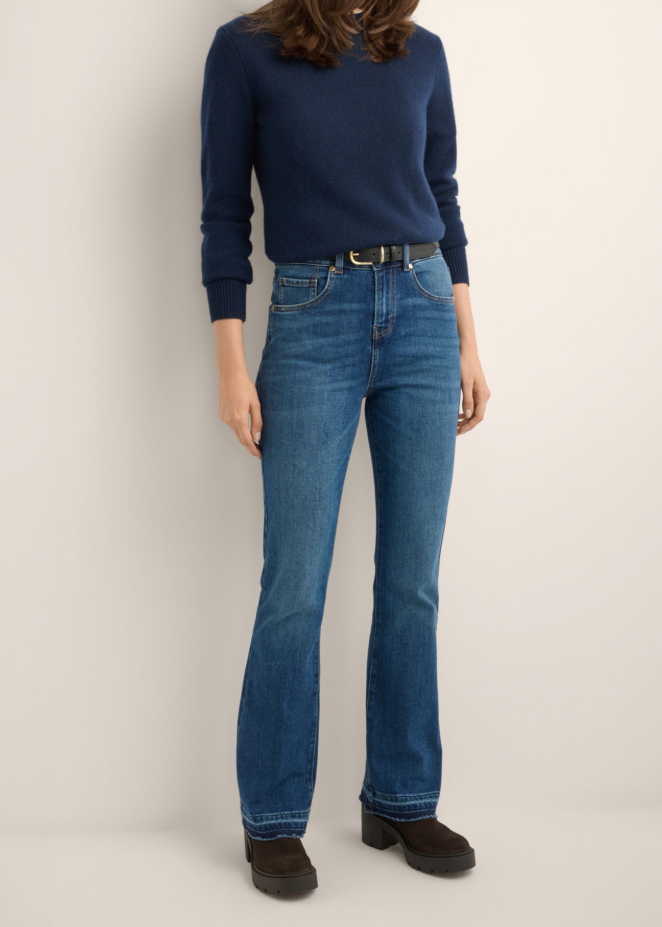 Women's navy blue denim pants JEADT-0017-7D(Z26), front view of the product on the model. Half of the silhouette visible.