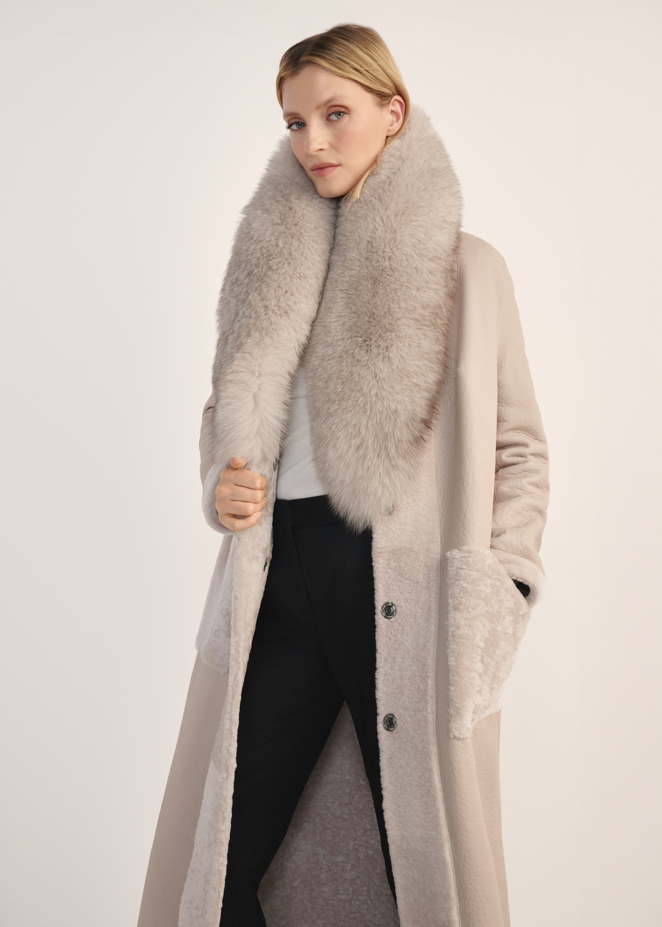 Light beige double-sided long women's sheepskin coat KOZDS-0089-3037(Z25) - front product view on white background. Knee-length silhouette visible.