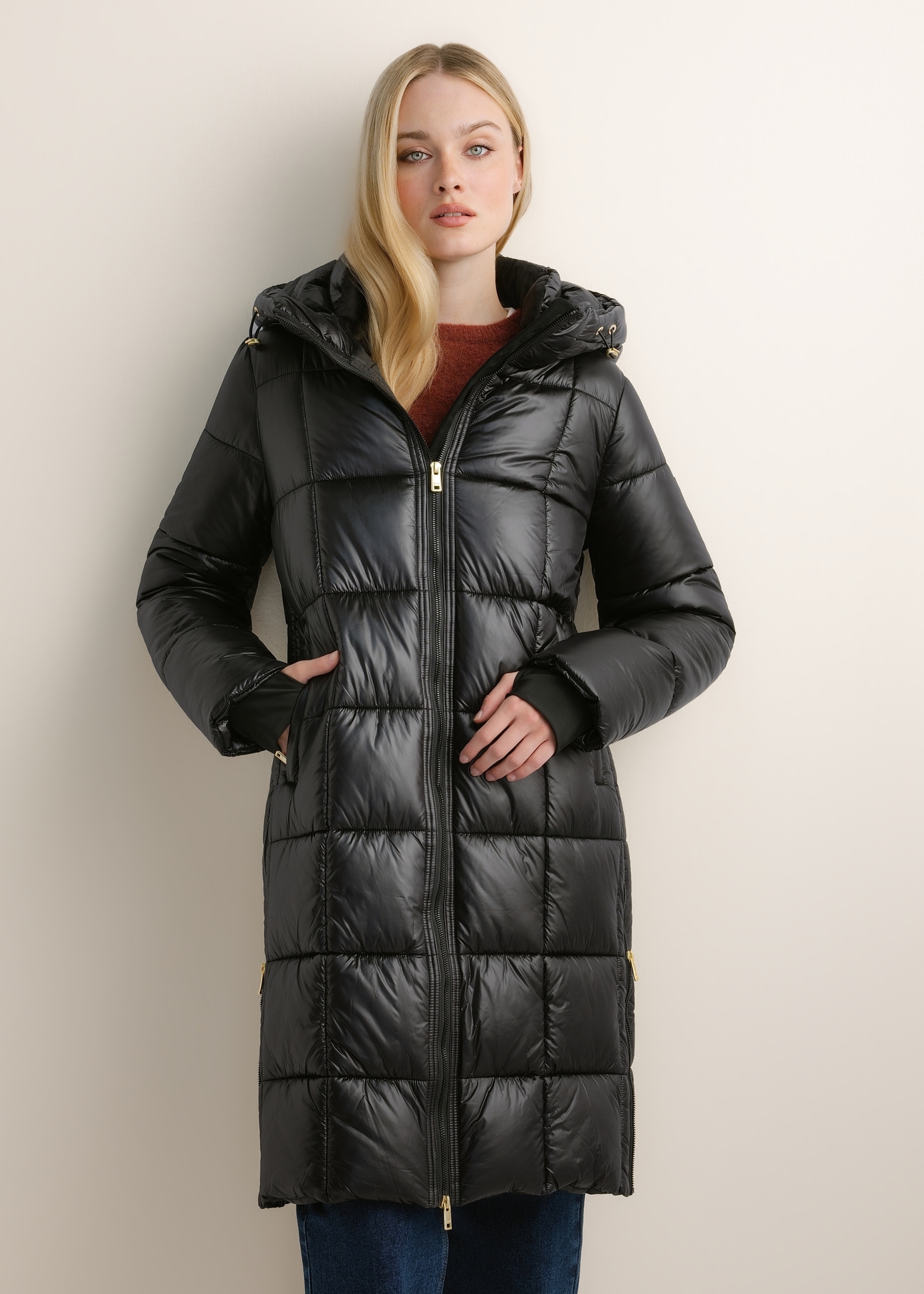 Black women's winter jacket KURDT-0677-99(Z26), front view of the product on the model. Half of the silhouette visible.