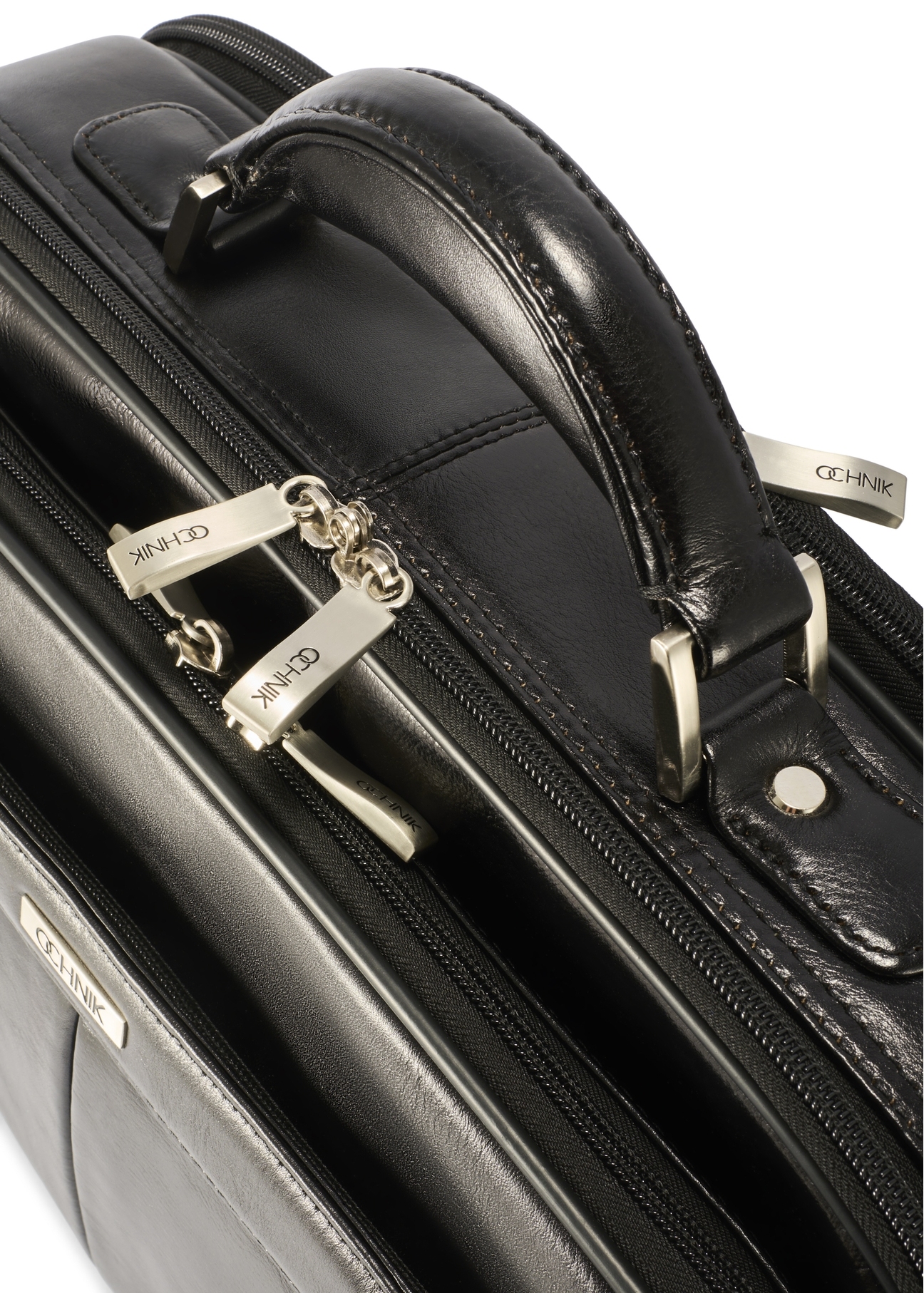 Black leather men's laptop bag TORMS-0482-99(Z25), close-up of the product zipper, view on a white background.