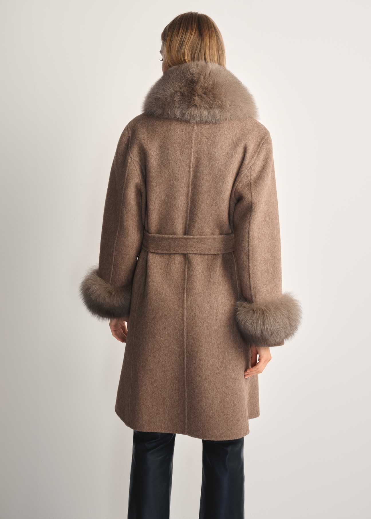 Long woolen women's fur coat in camel color FUTDF-0112-3181(Z25) - product view from the back on the model on a white background. Visible silhouette to the knee.