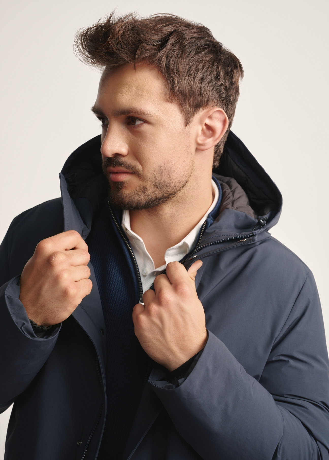 Navy blue men's jacket with natural insulation KURMT-0394-69(Z25) - close-up of detail on white background.