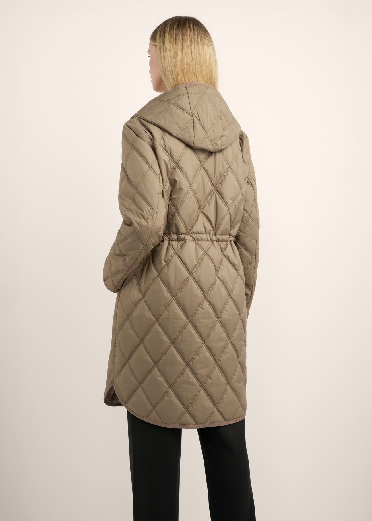 Women's dark beige jacket KURDT-0579-1K(Z26), back view of the product on the model. Half of the silhouette visible.